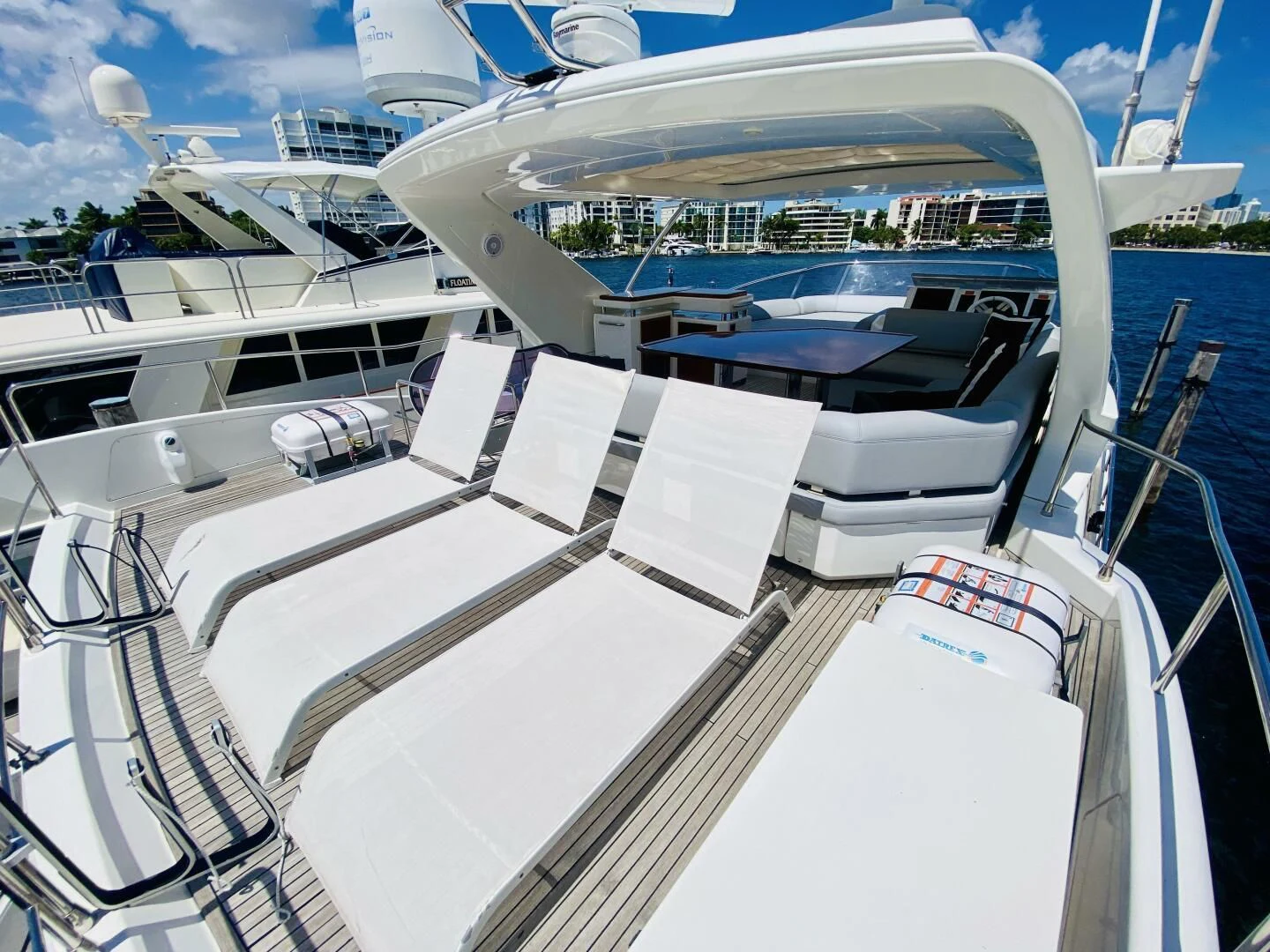 a large white yacht aboard SOMEWHERE I BELONG Yacht for Sale