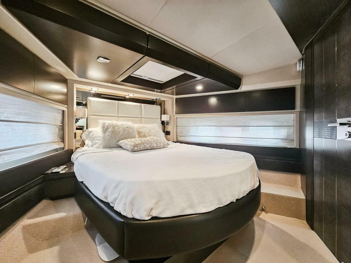 a bed in a room aboard SOMEWHERE I BELONG Yacht for Sale