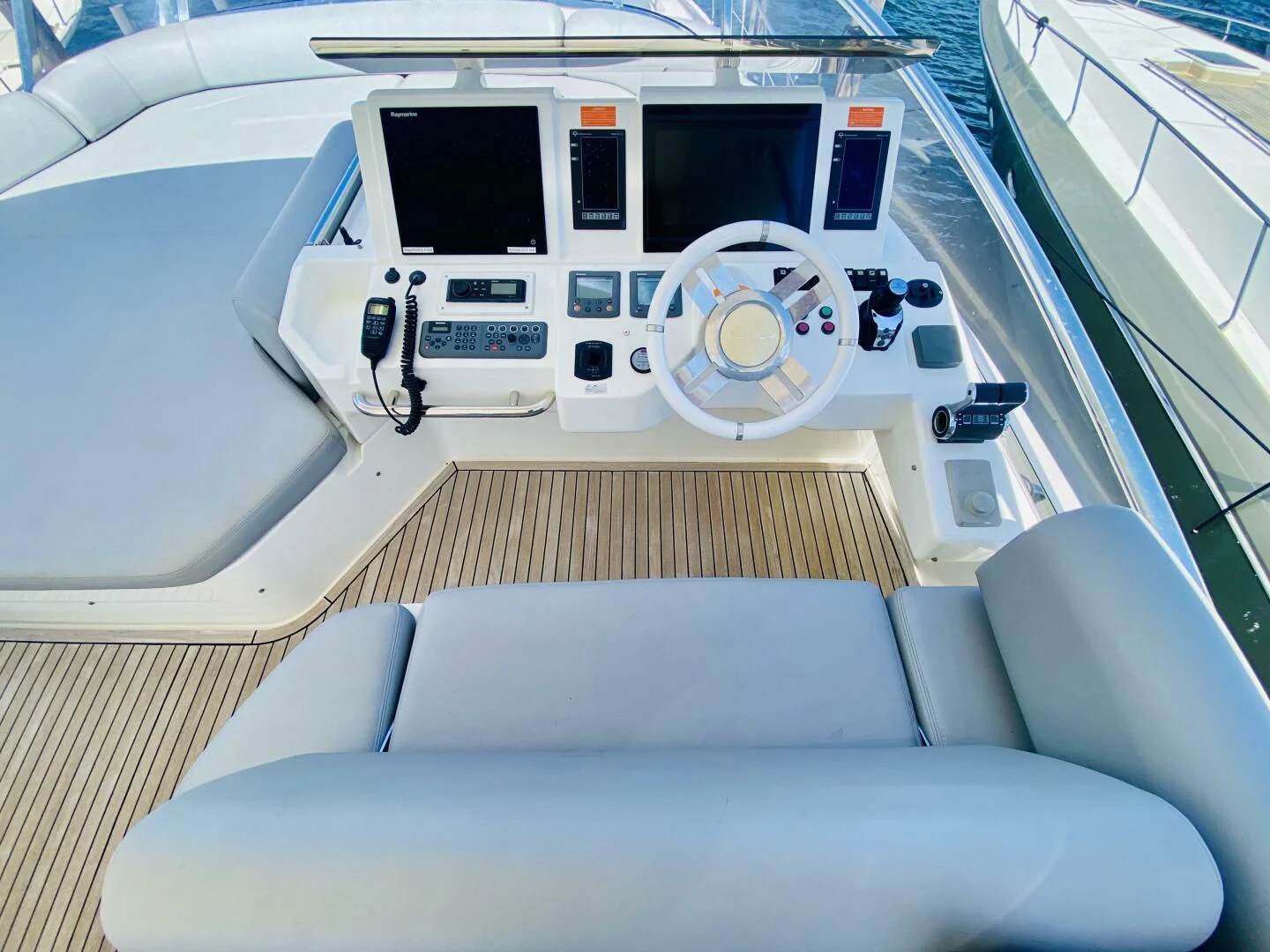 a white vehicle with a white interior aboard SOMEWHERE I BELONG Yacht for Sale