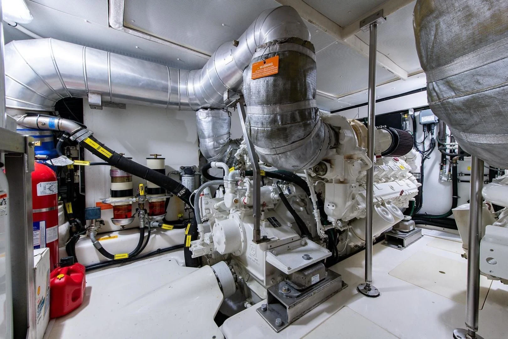 a machine with a large metal cylinder aboard SOMEWHERE I BELONG Yacht for Sale