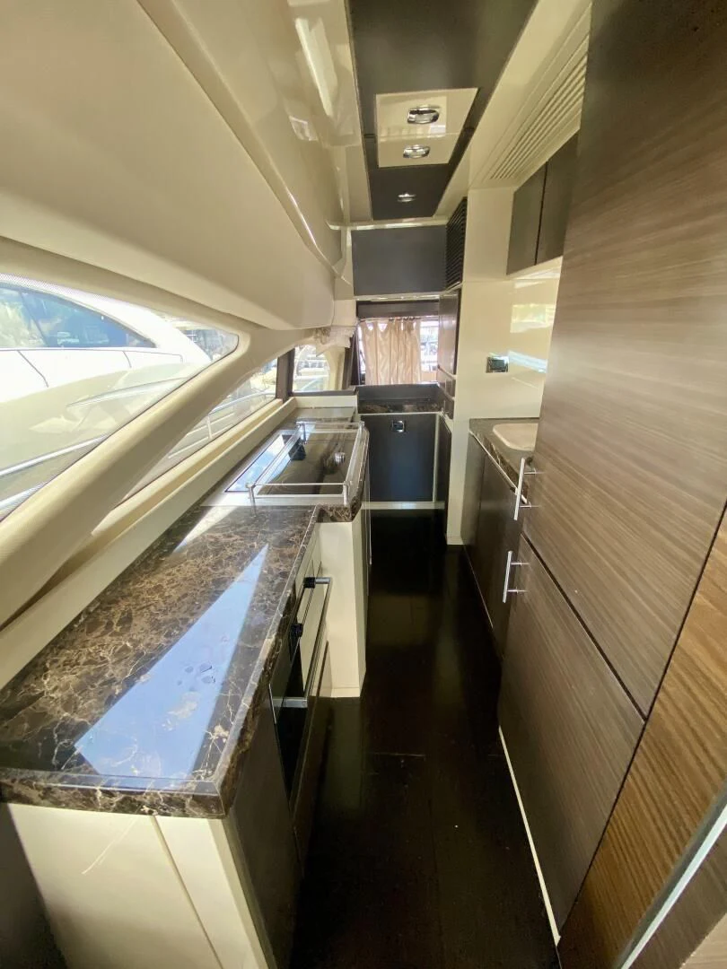 a long hallway with a tub aboard SOMEWHERE I BELONG Yacht for Sale