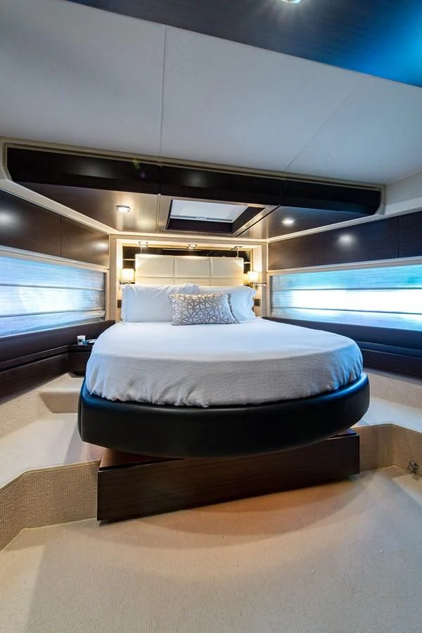 a bed in a room aboard SOMEWHERE I BELONG Yacht for Sale