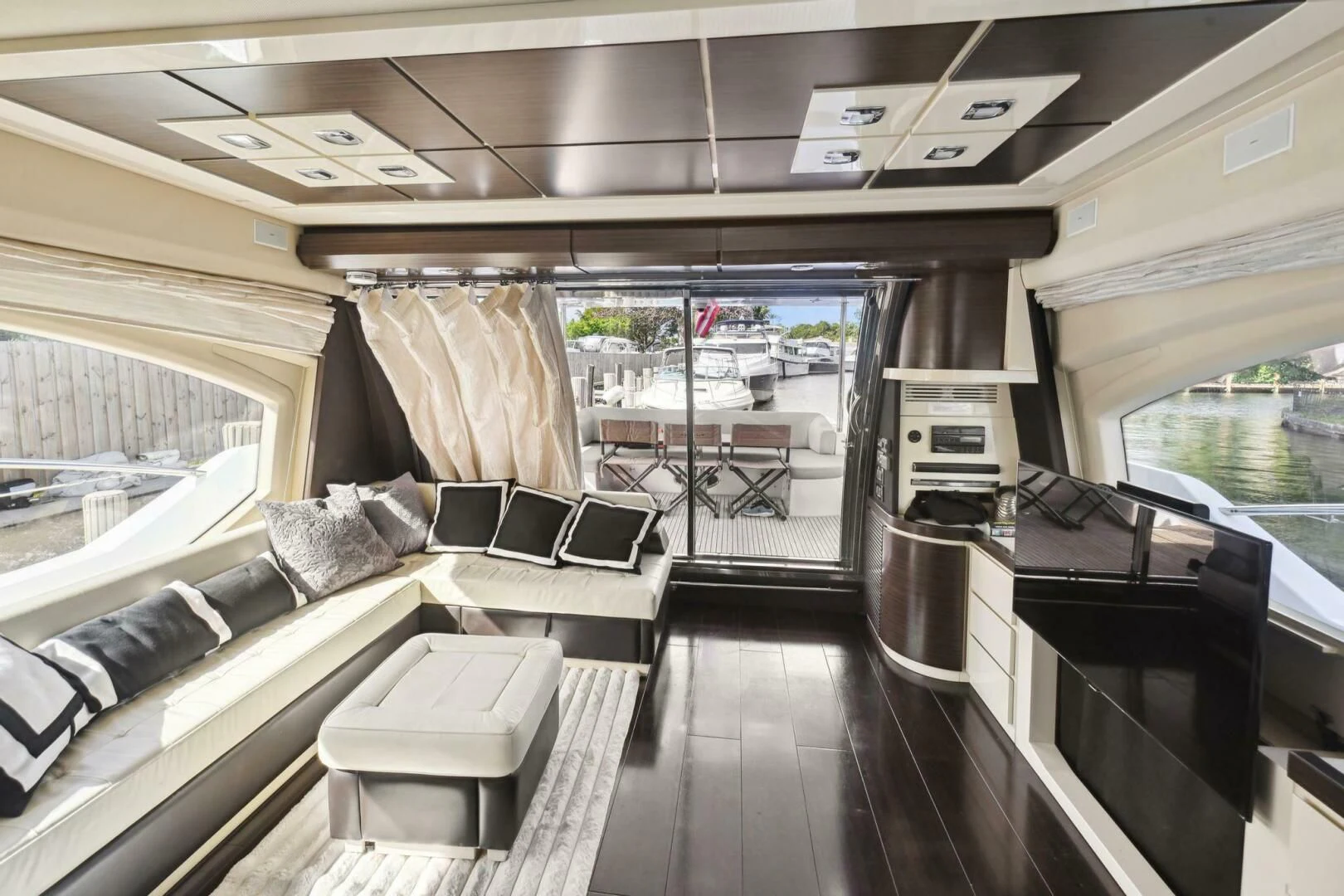 a room with a couch and a table aboard SOMEWHERE I BELONG Yacht for Sale
