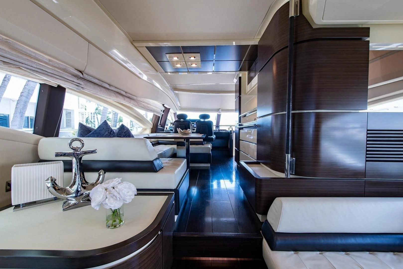a room with a table and chairs aboard SOMEWHERE I BELONG Yacht for Sale