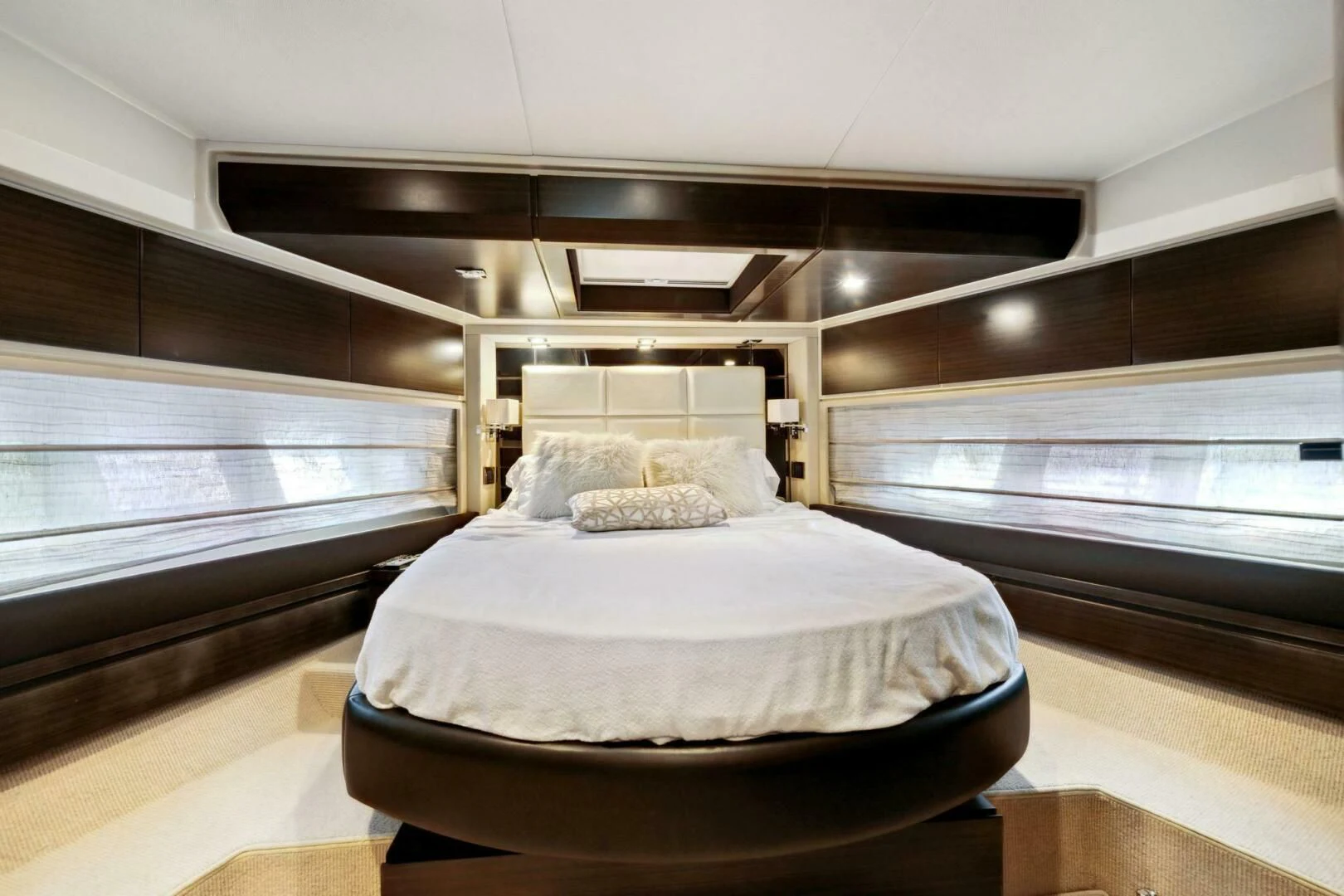 a bed in a room aboard SOMEWHERE I BELONG Yacht for Sale