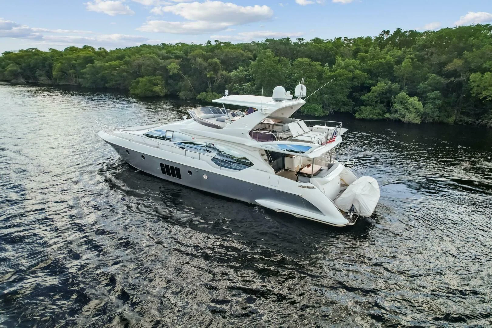 a boat on the water aboard SOMEWHERE I BELONG Yacht for Sale
