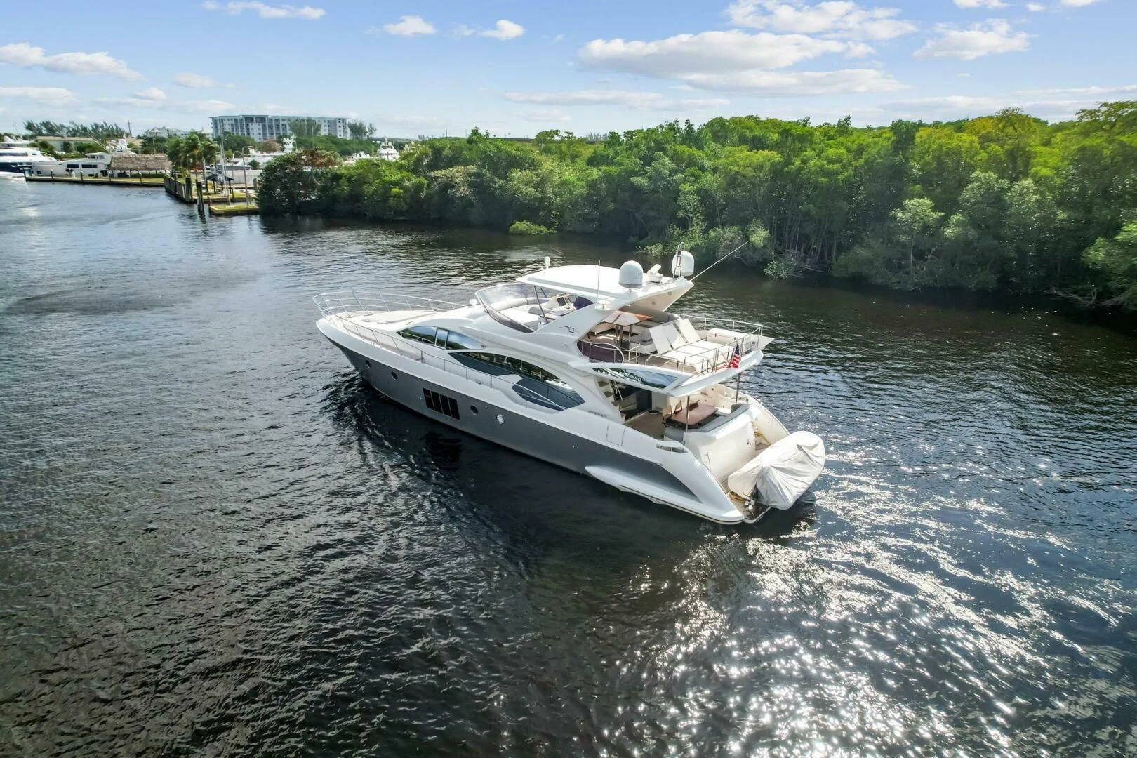 a boat on the water aboard SOMEWHERE I BELONG Yacht for Sale