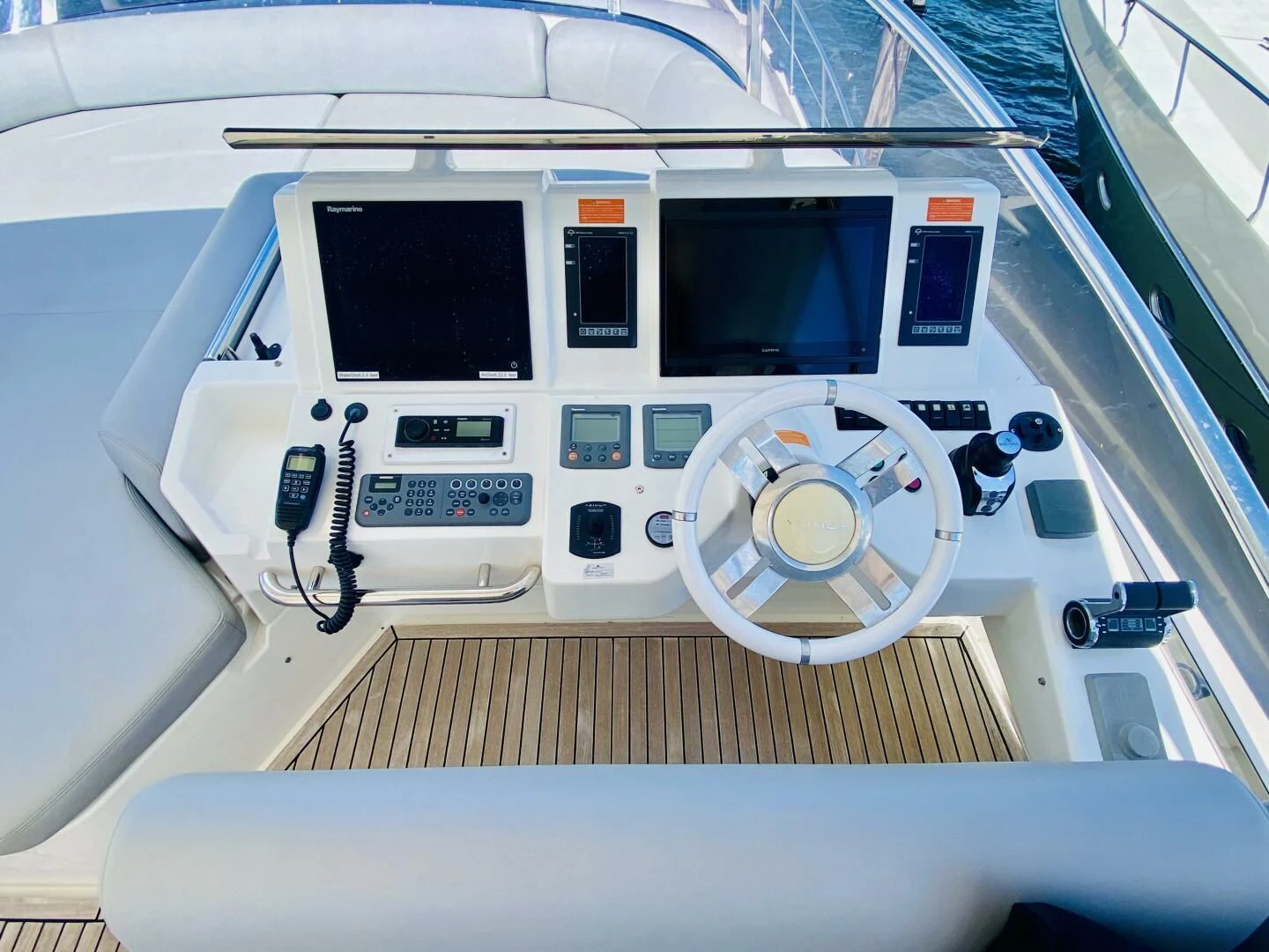 a white helicopter with a black screen aboard SOMEWHERE I BELONG Yacht for Sale