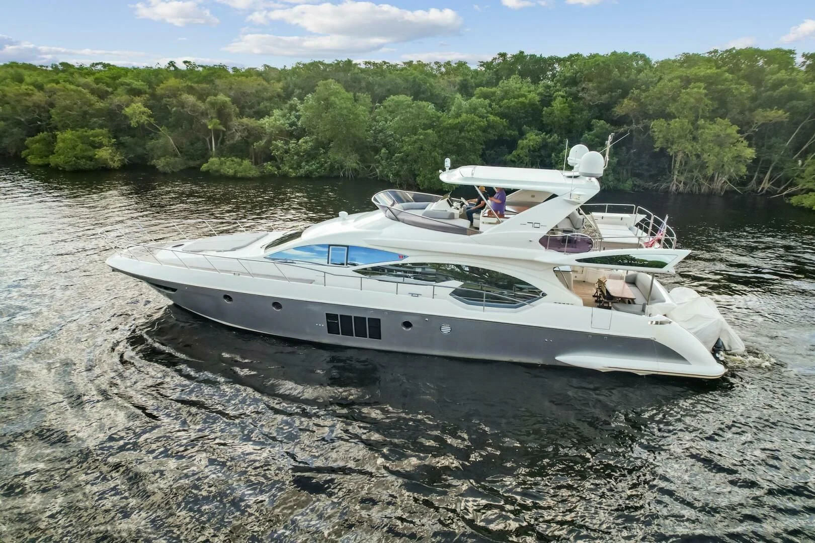 a boat on the water aboard SOMEWHERE I BELONG Yacht for Sale