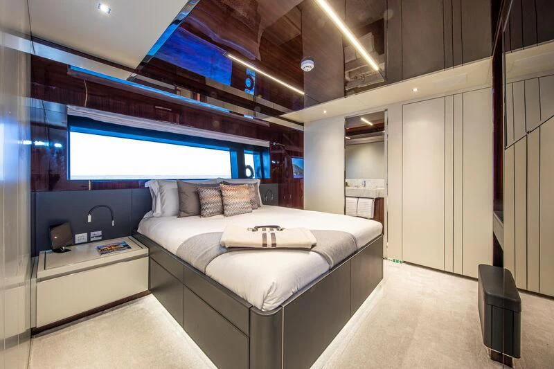 a bed in a room aboard FIGURATI Yacht for Sale