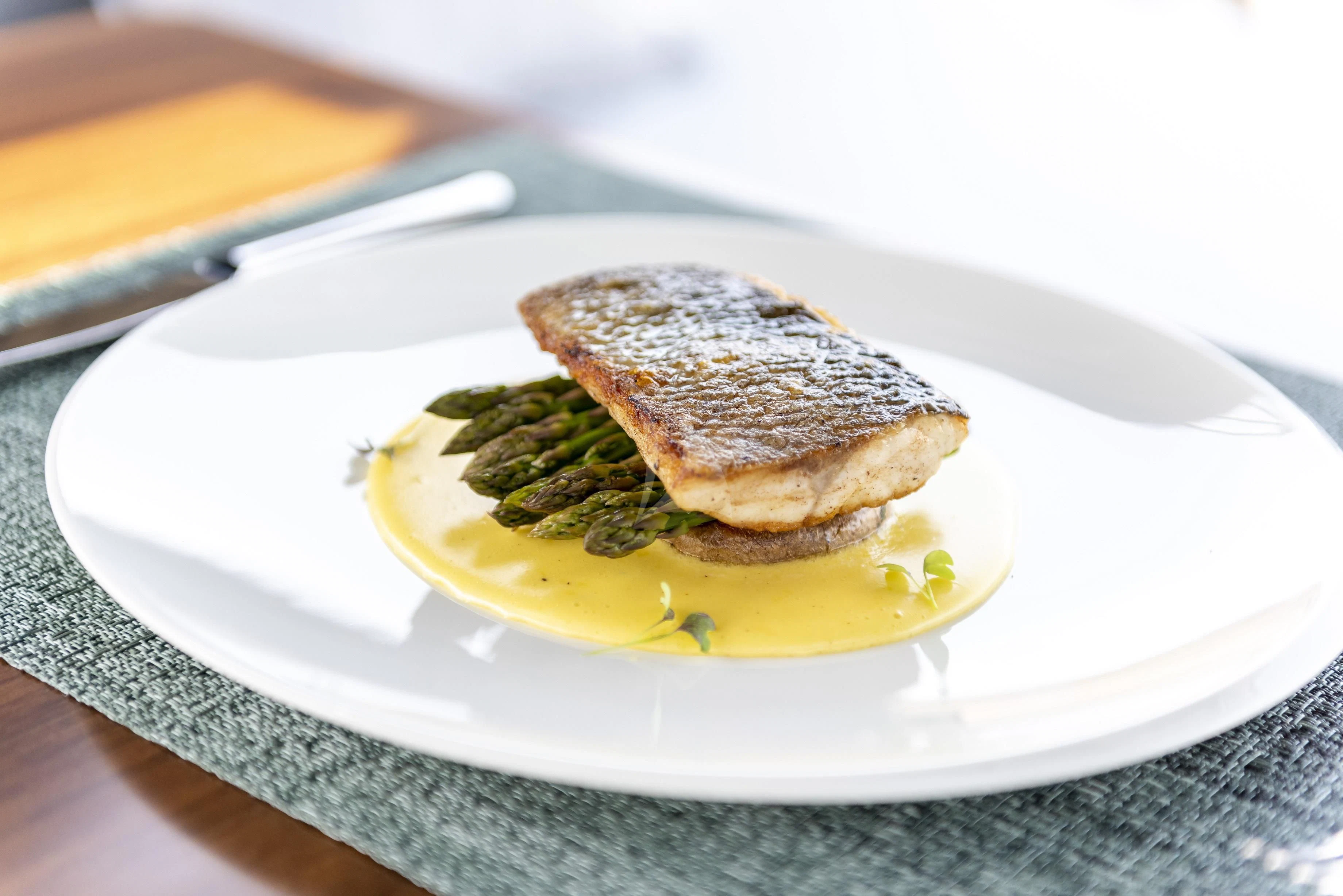 a plate of food aboard FIGURATI Yacht for Sale