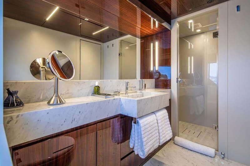 a bathroom with a large countertop aboard FIGURATI Yacht for Sale