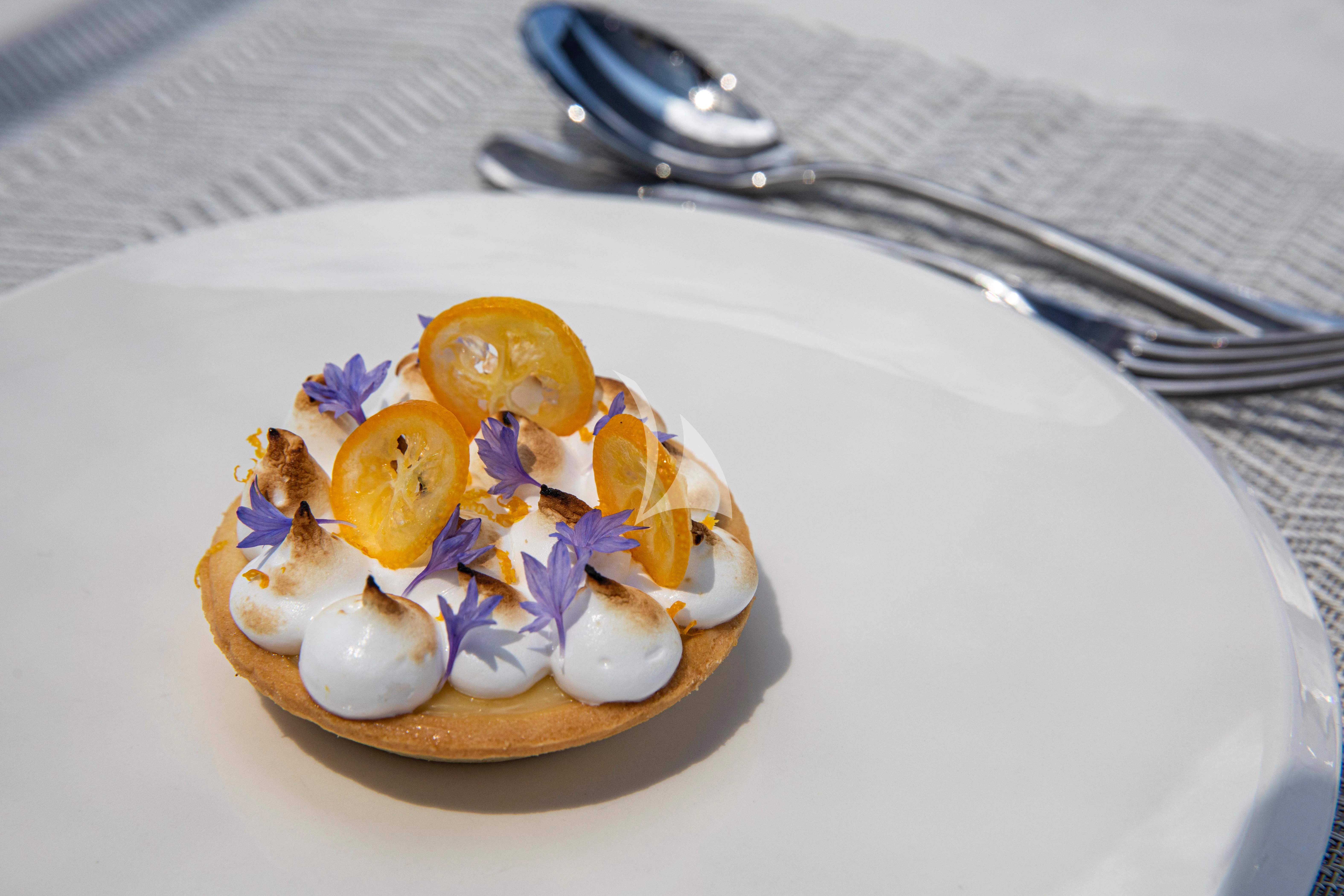 a plate of food aboard FIGURATI Yacht for Sale