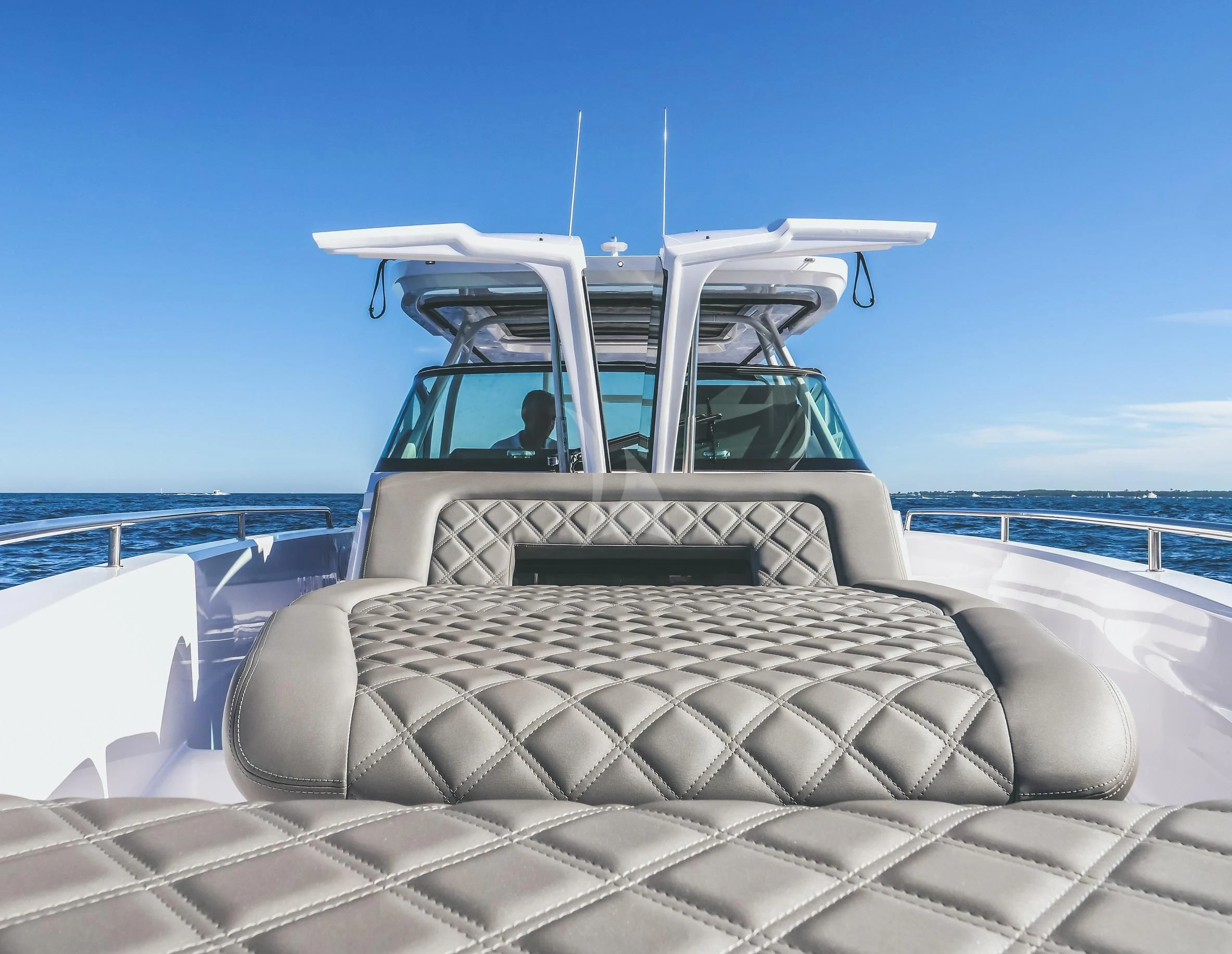 a white car with a roof aboard FIGURATI Yacht for Sale