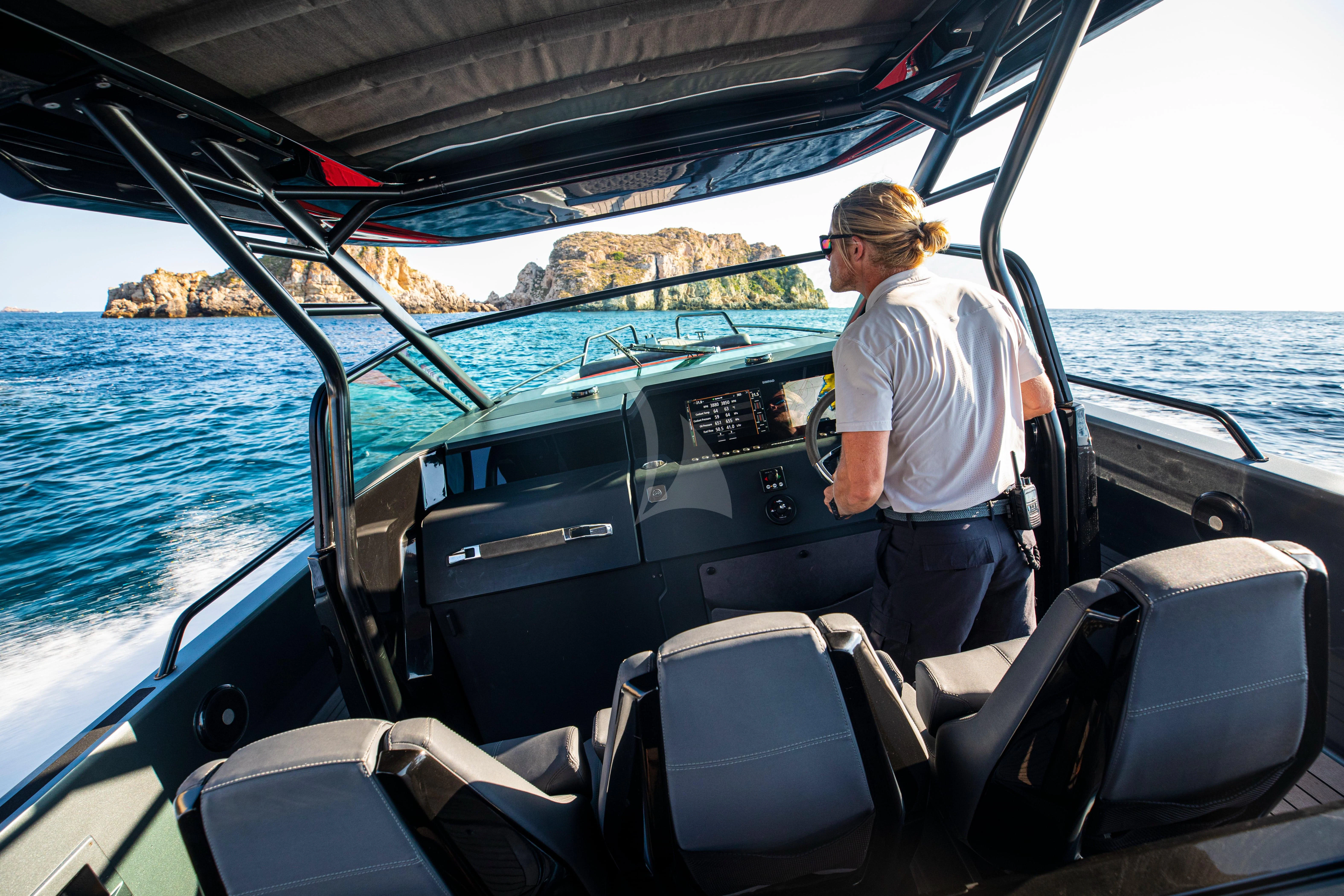 a person on a boat aboard FIGURATI Yacht for Sale
