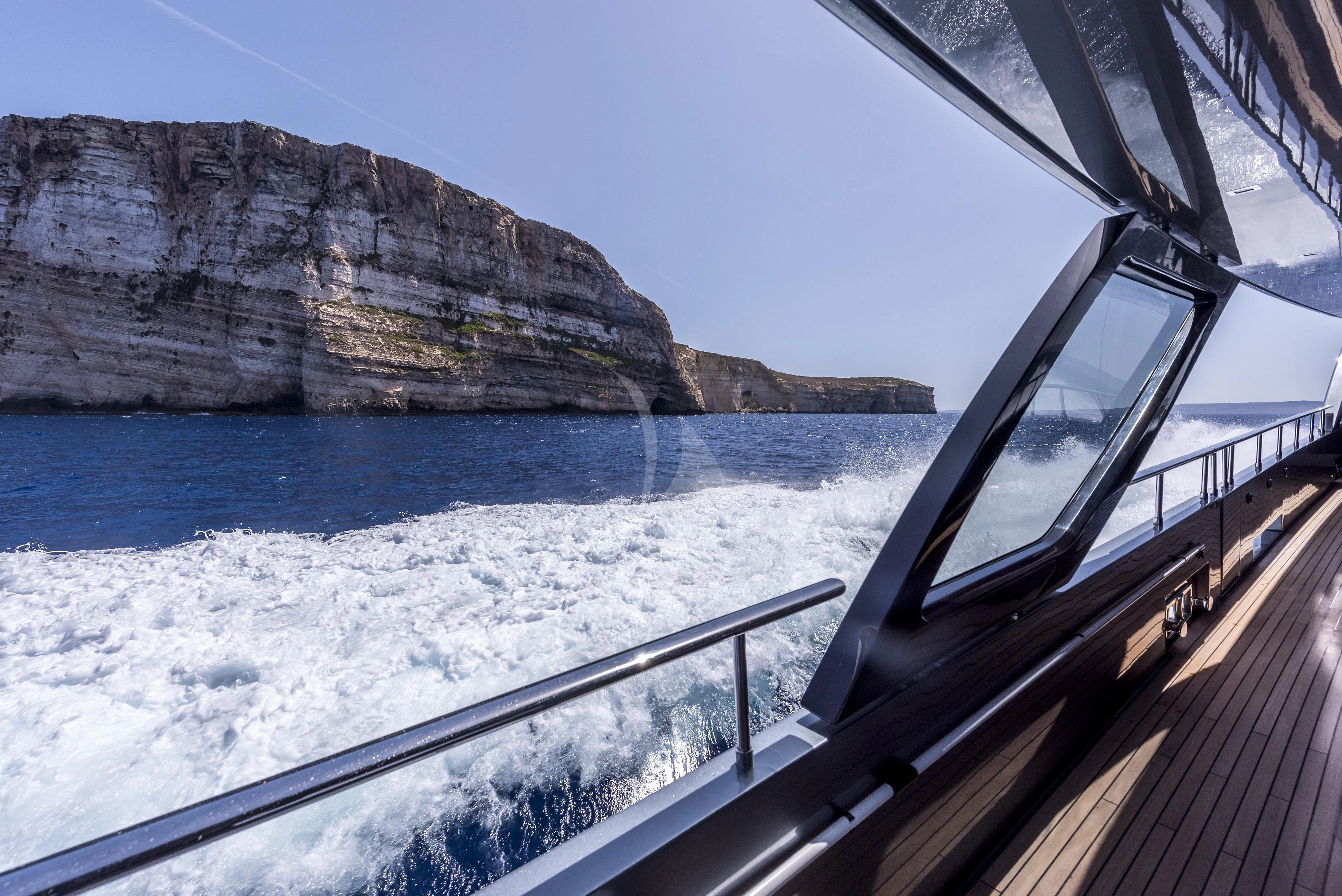 a boat on the water aboard FIGURATI Yacht for Sale