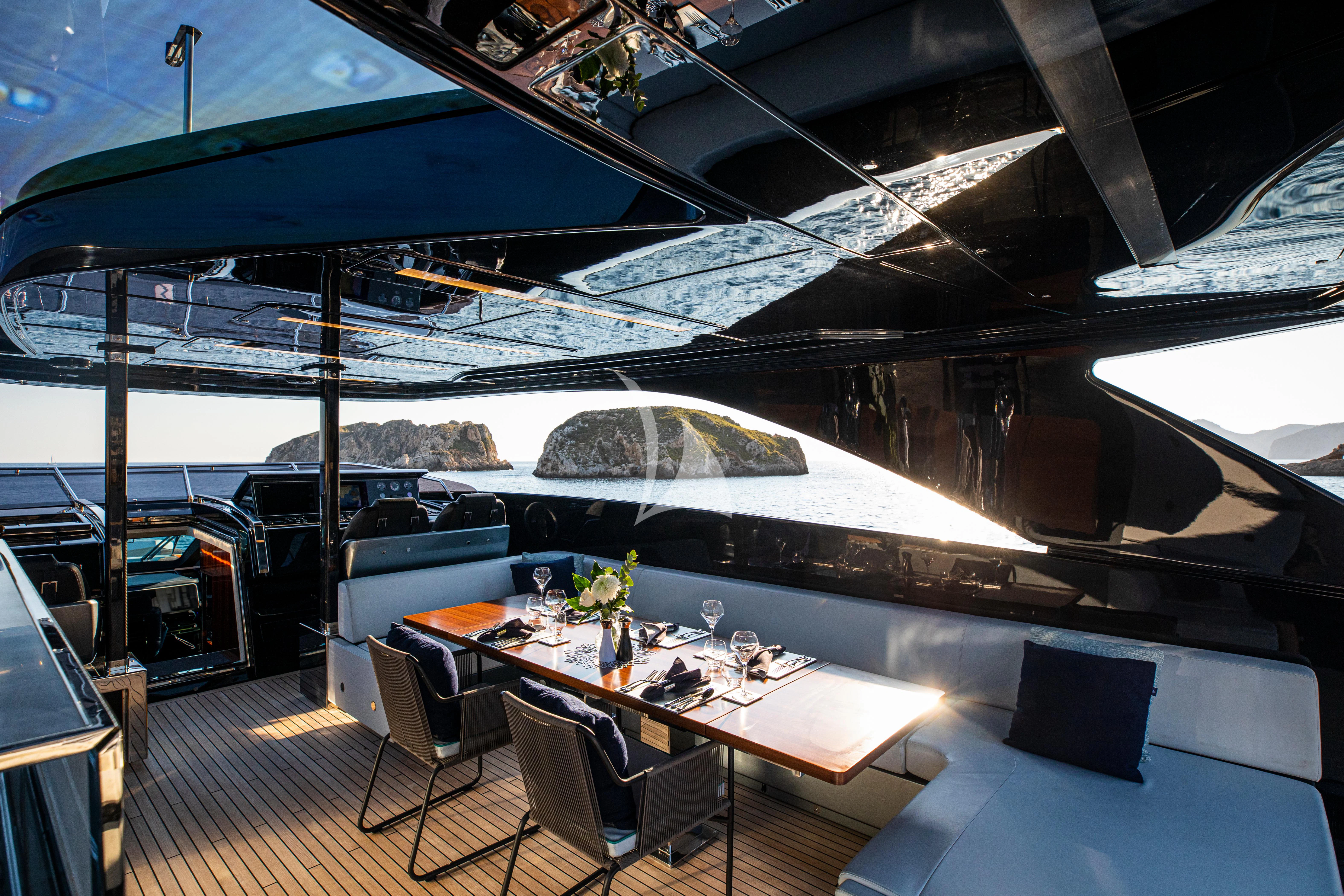 a boat on a deck aboard FIGURATI Yacht for Sale