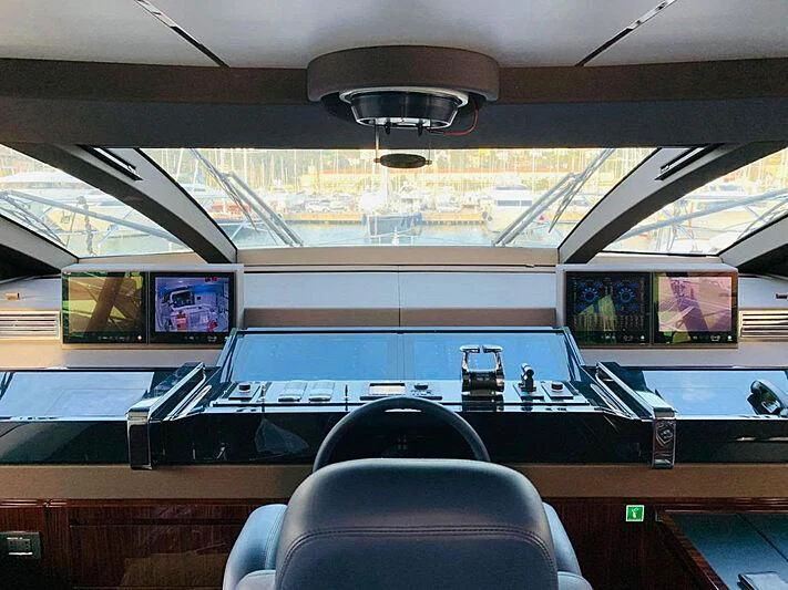 a room with a row of computers aboard FIGURATI Yacht for Sale