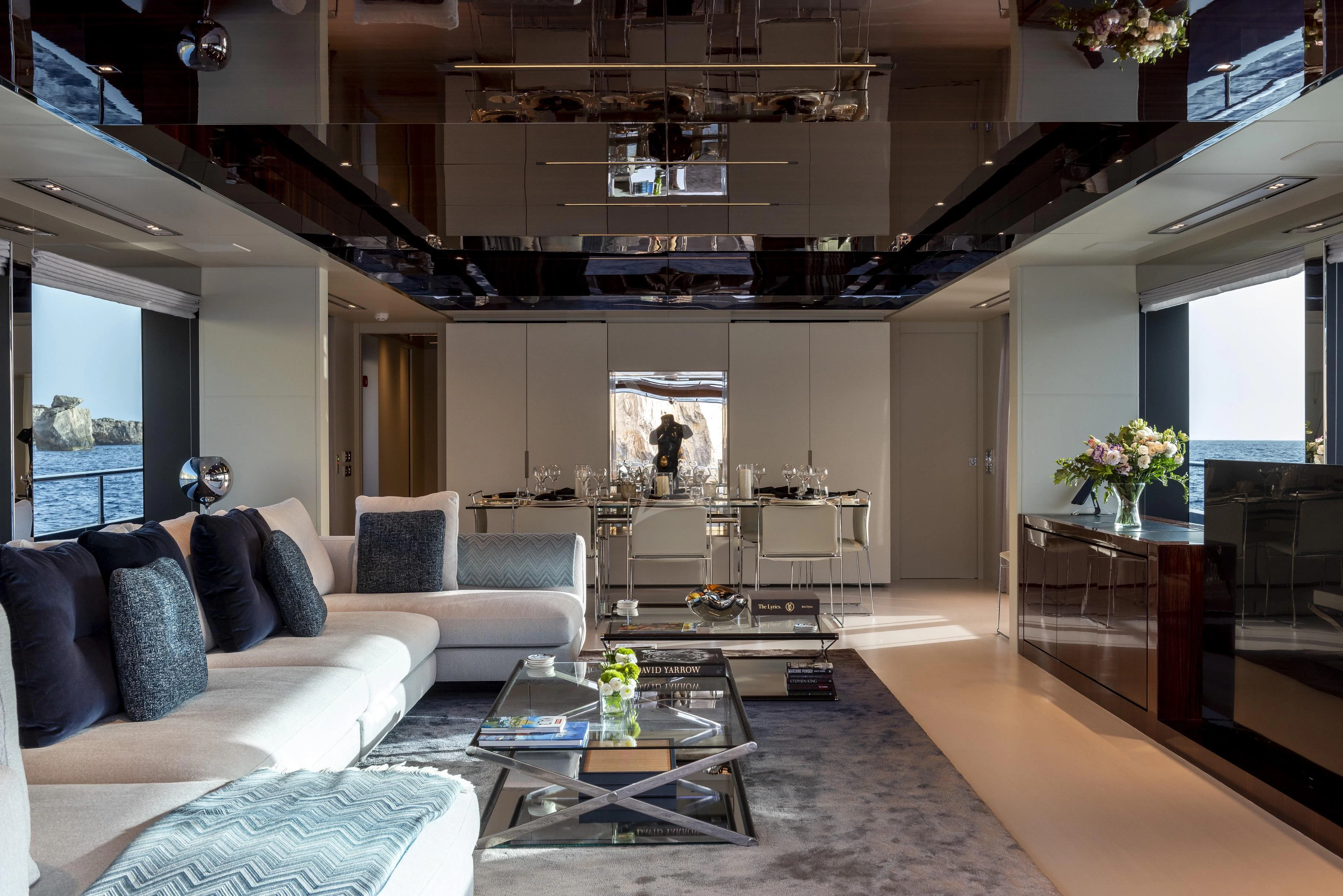 a living room with a large open floor plan aboard FIGURATI Yacht for Sale