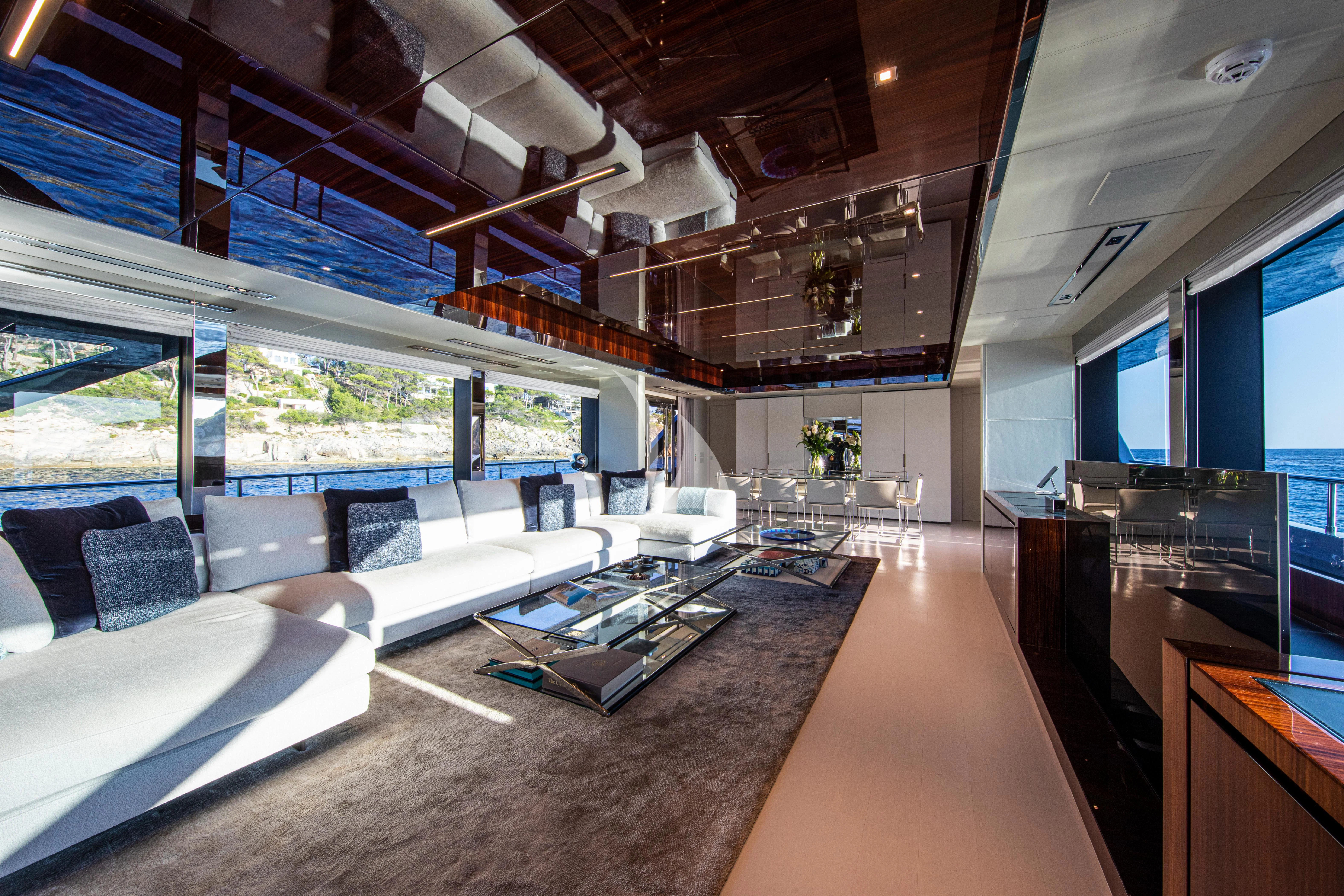 a room with a large window and a large screen aboard FIGURATI Yacht for Sale