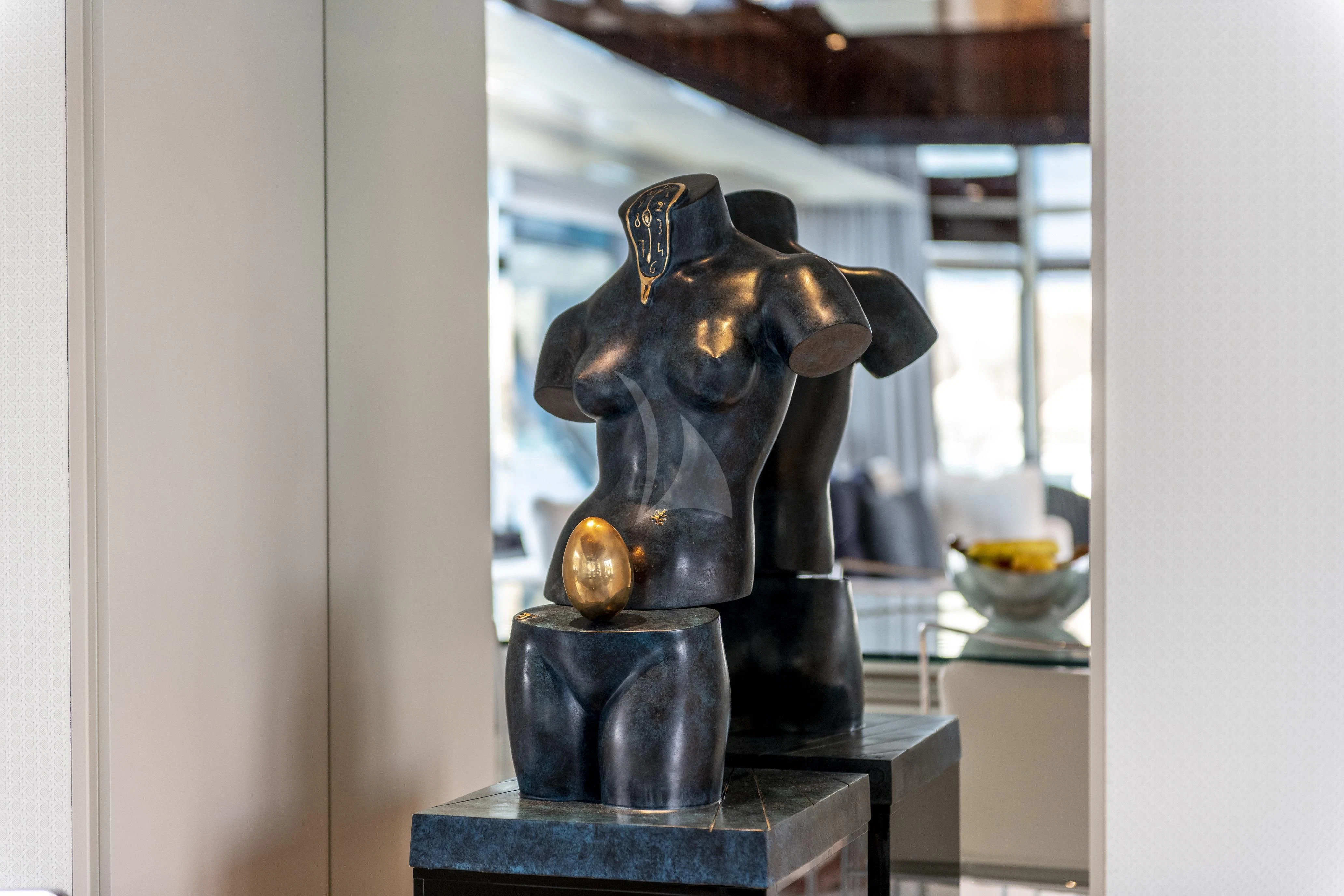 a statue of a bear aboard FIGURATI Yacht for Sale