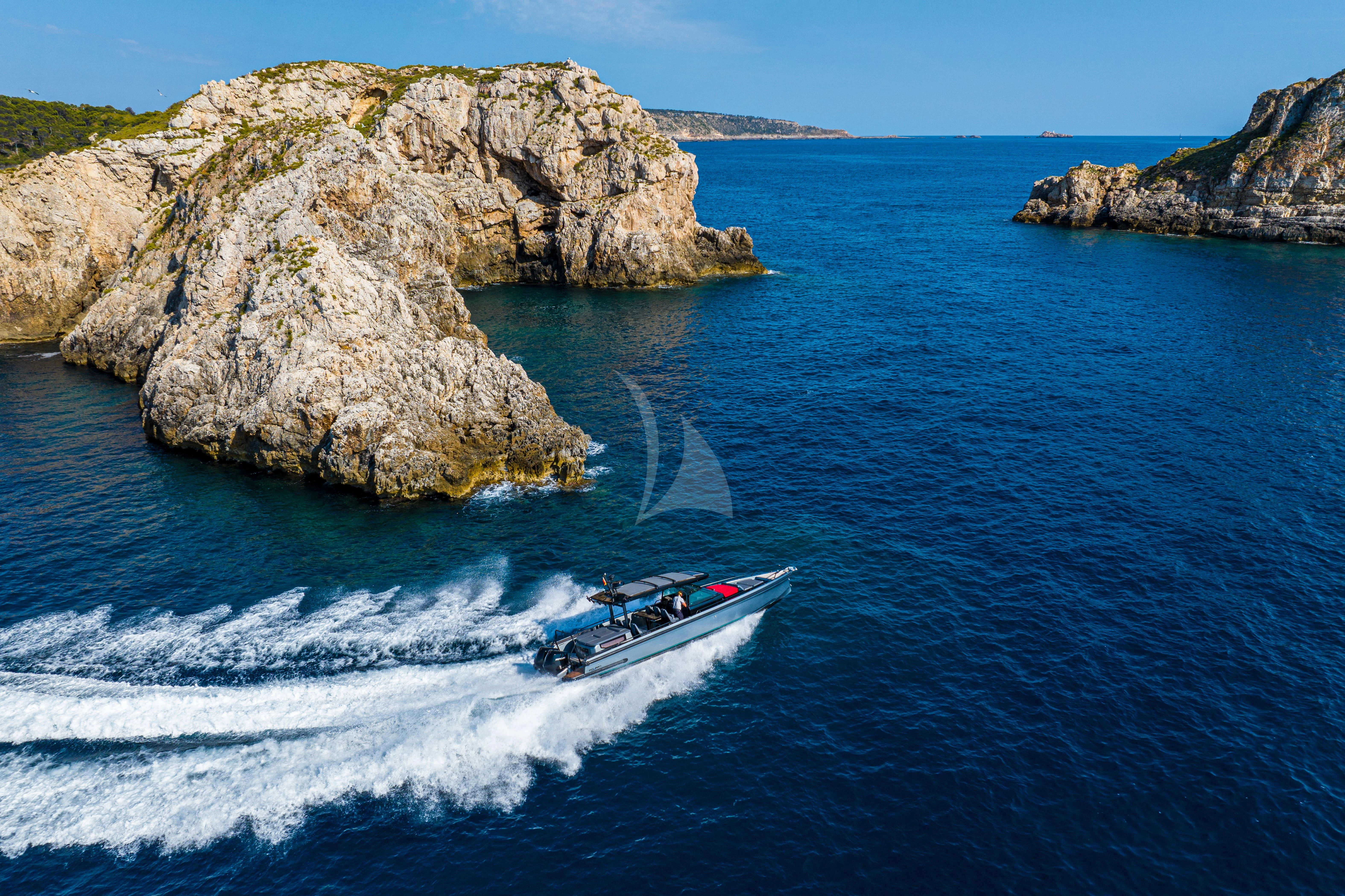 a boat on the water aboard FIGURATI Yacht for Sale