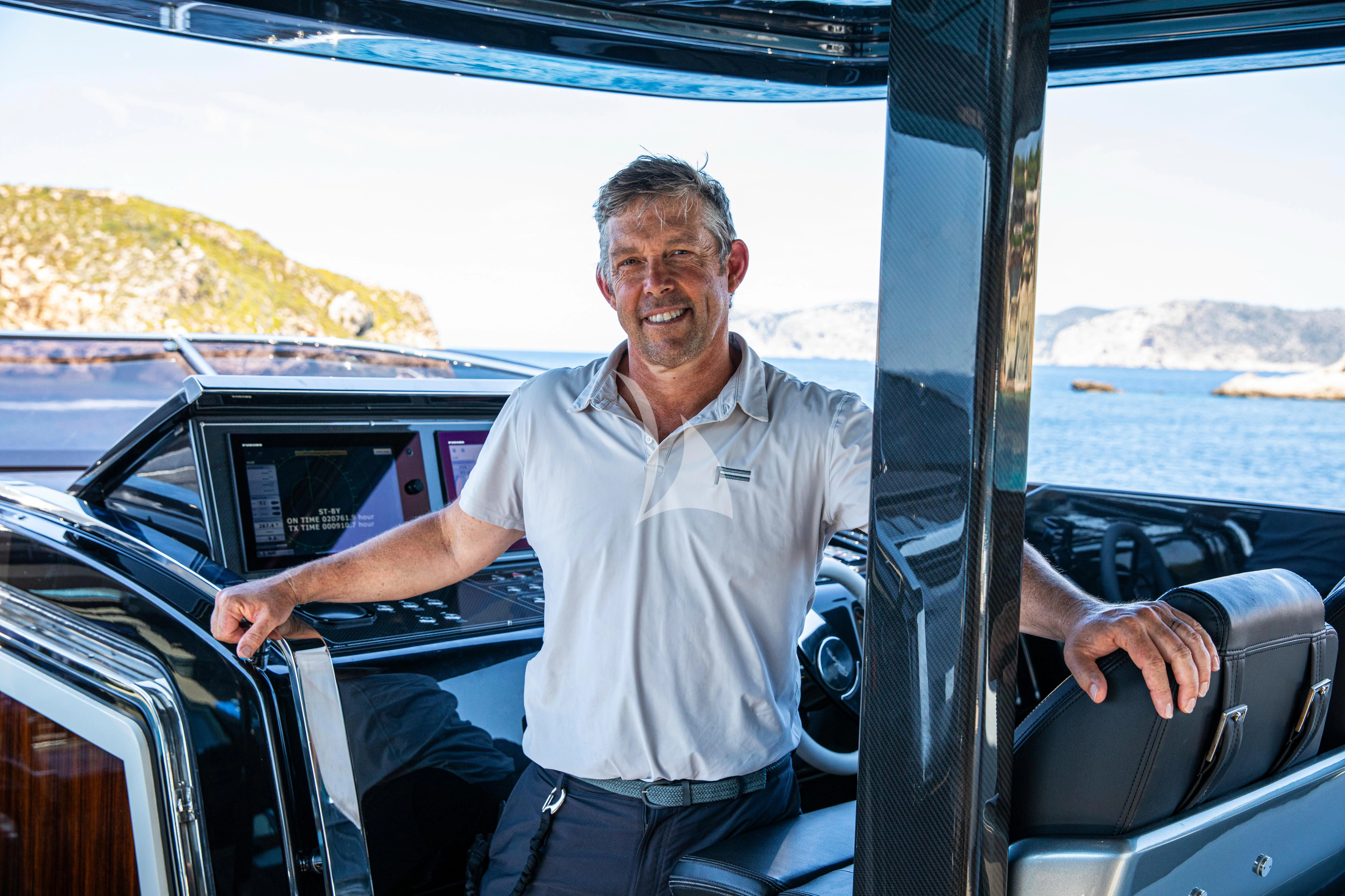 a man in a car aboard FIGURATI Yacht for Sale