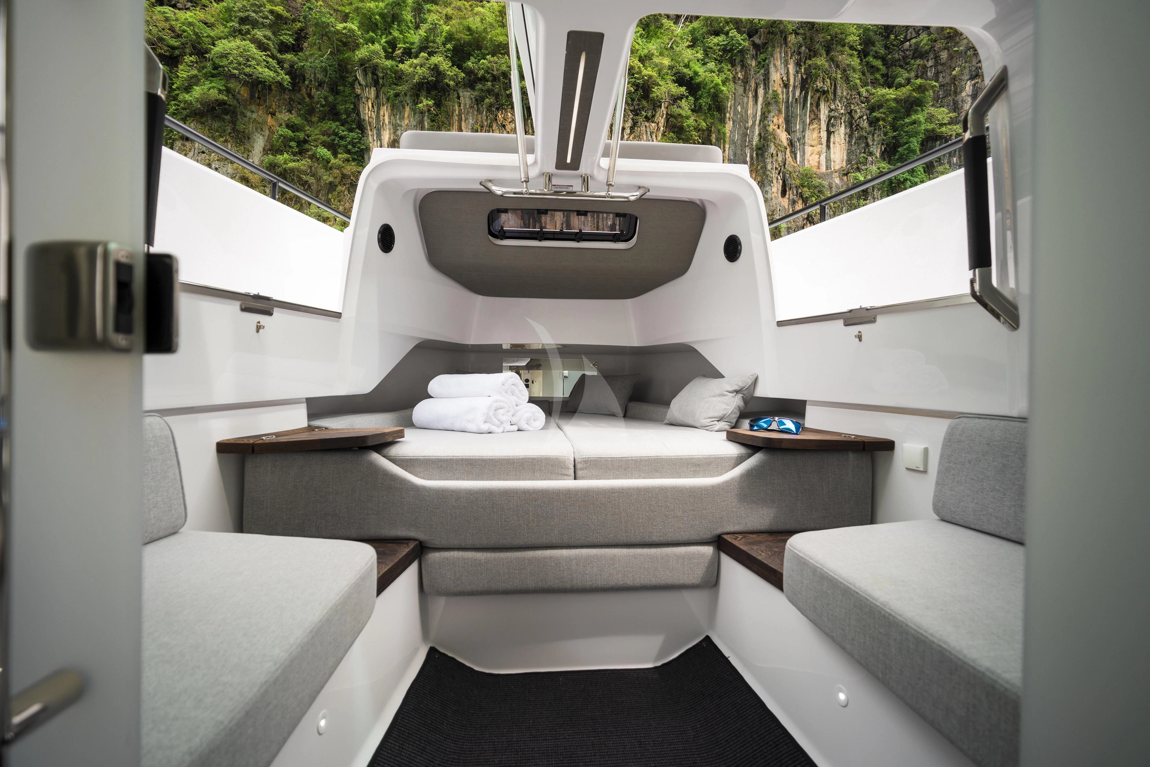 a white machine on a white surface aboard FIGURATI Yacht for Sale
