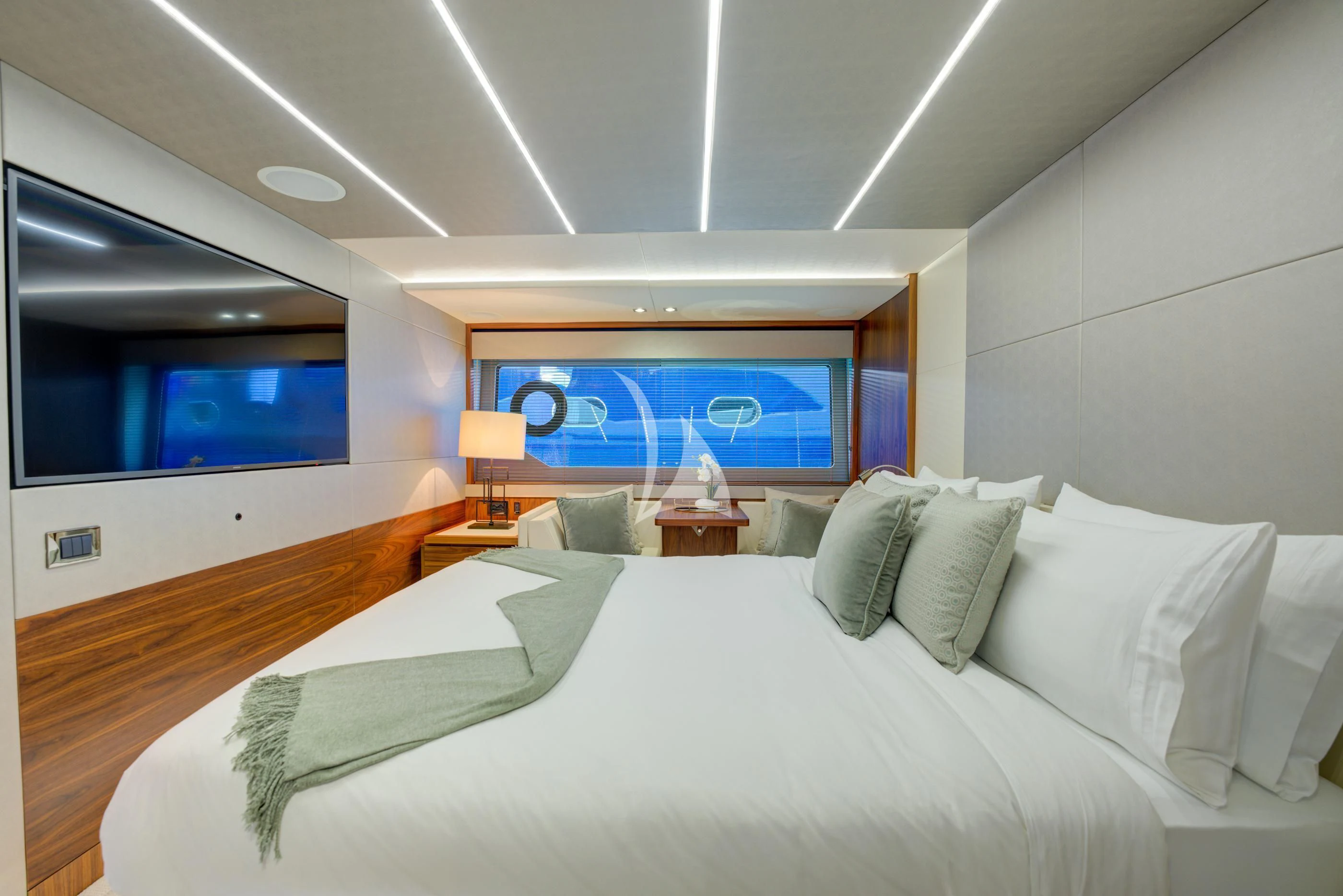 a bed with white sheets aboard MIKEL ANGELO Yacht for Charter