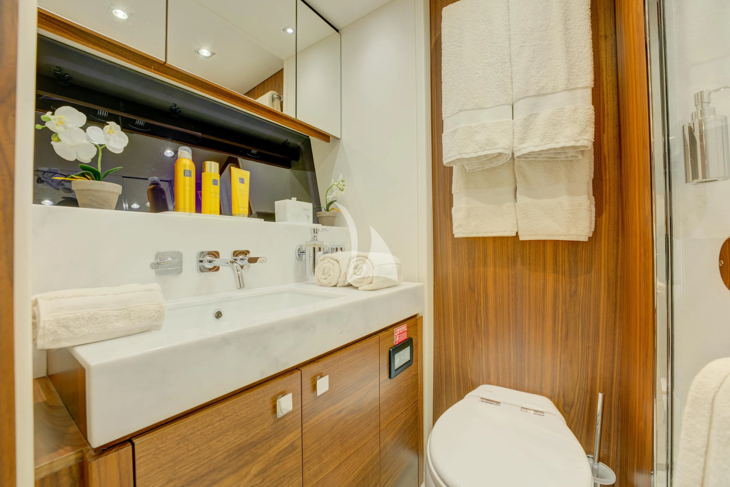 a bathroom with a sink and toilet aboard MIKEL ANGELO Yacht for Charter