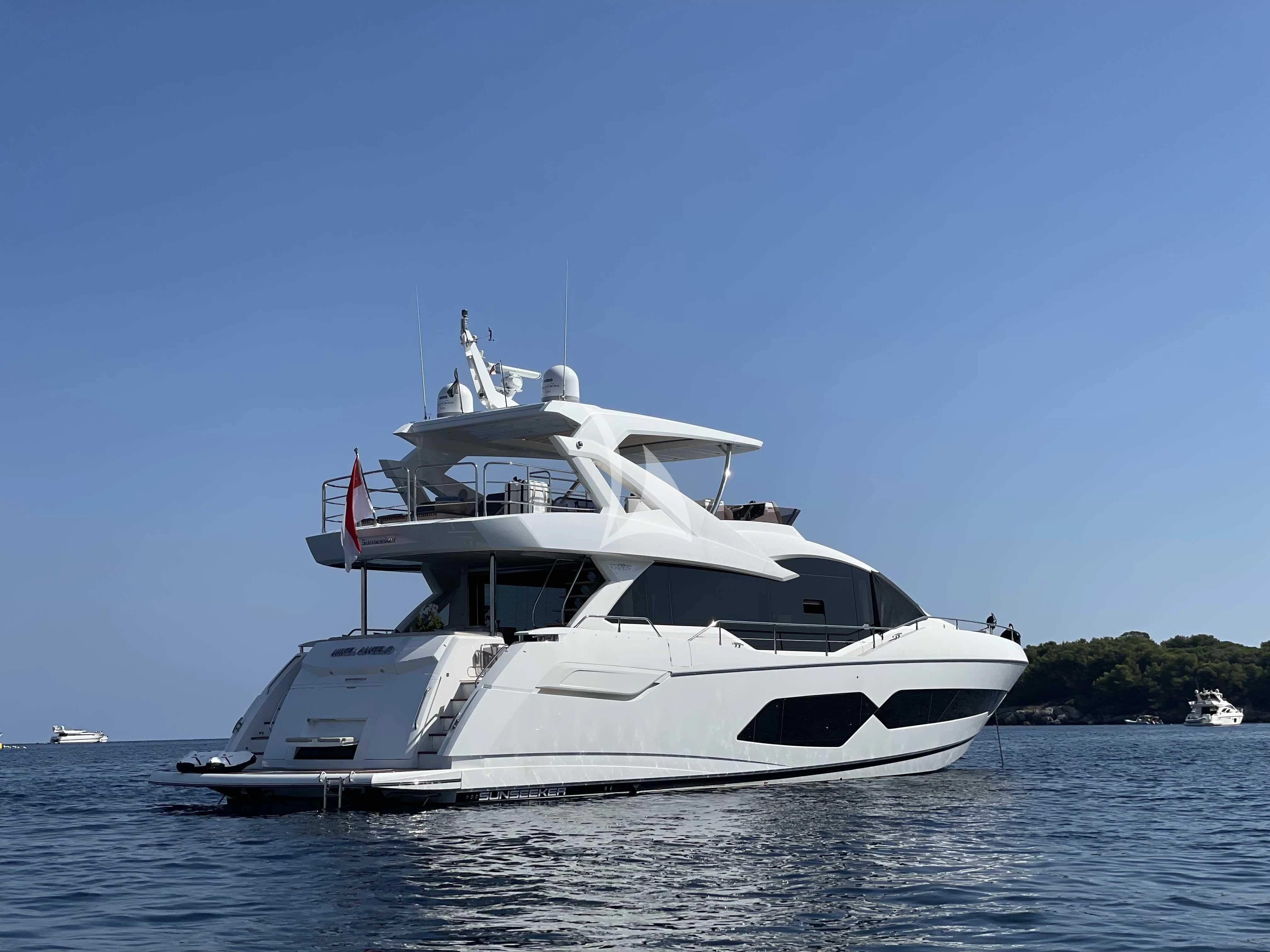 a white yacht on the water aboard MIKEL ANGELO Yacht for Charter