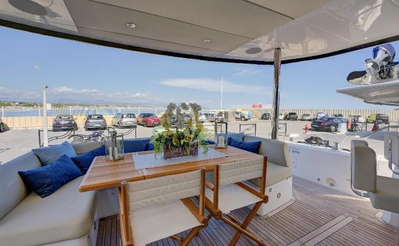 a table on a deck aboard MIKEL ANGELO Yacht for Charter