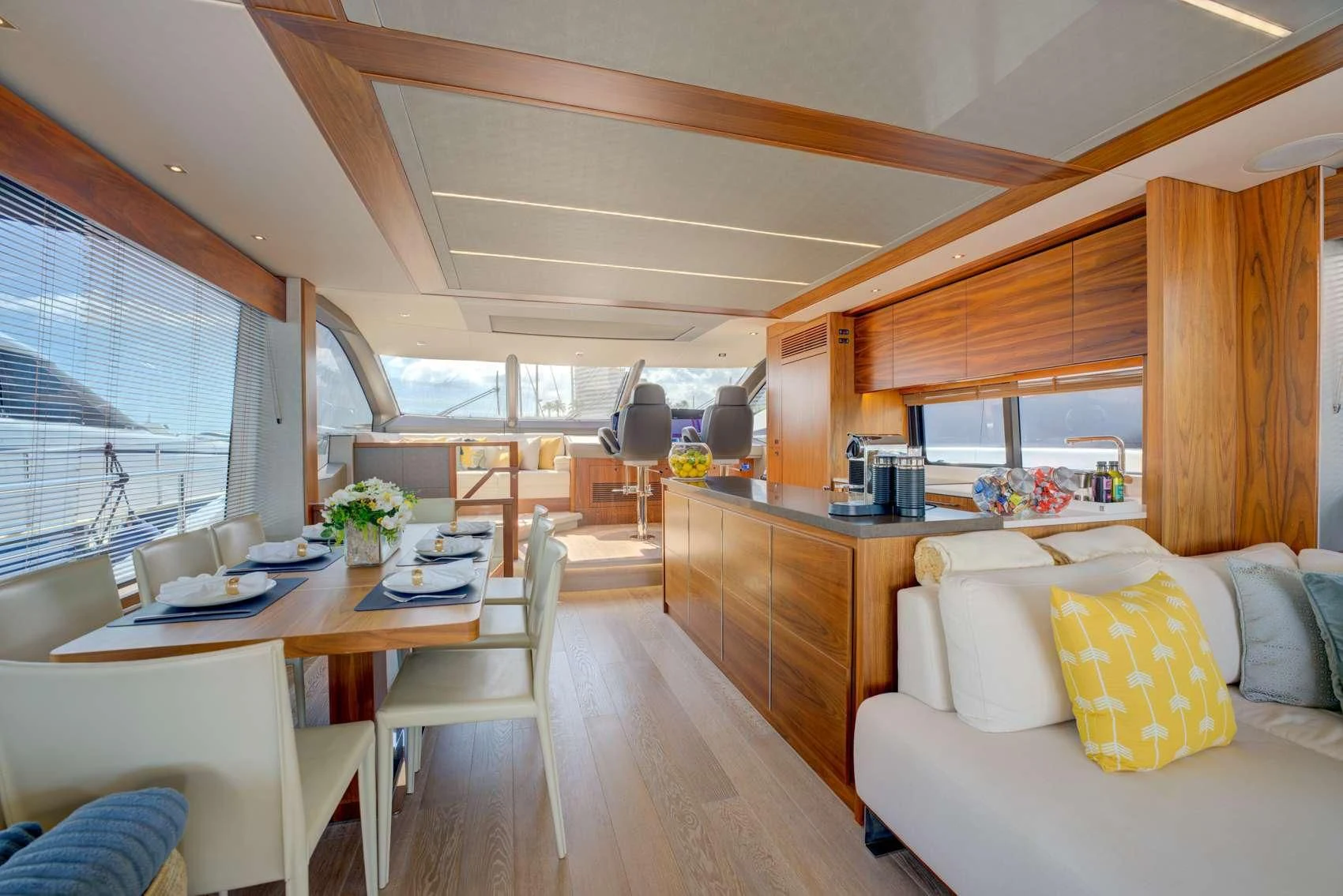 a living room with a couch and a table aboard MIKEL ANGELO Yacht for Charter