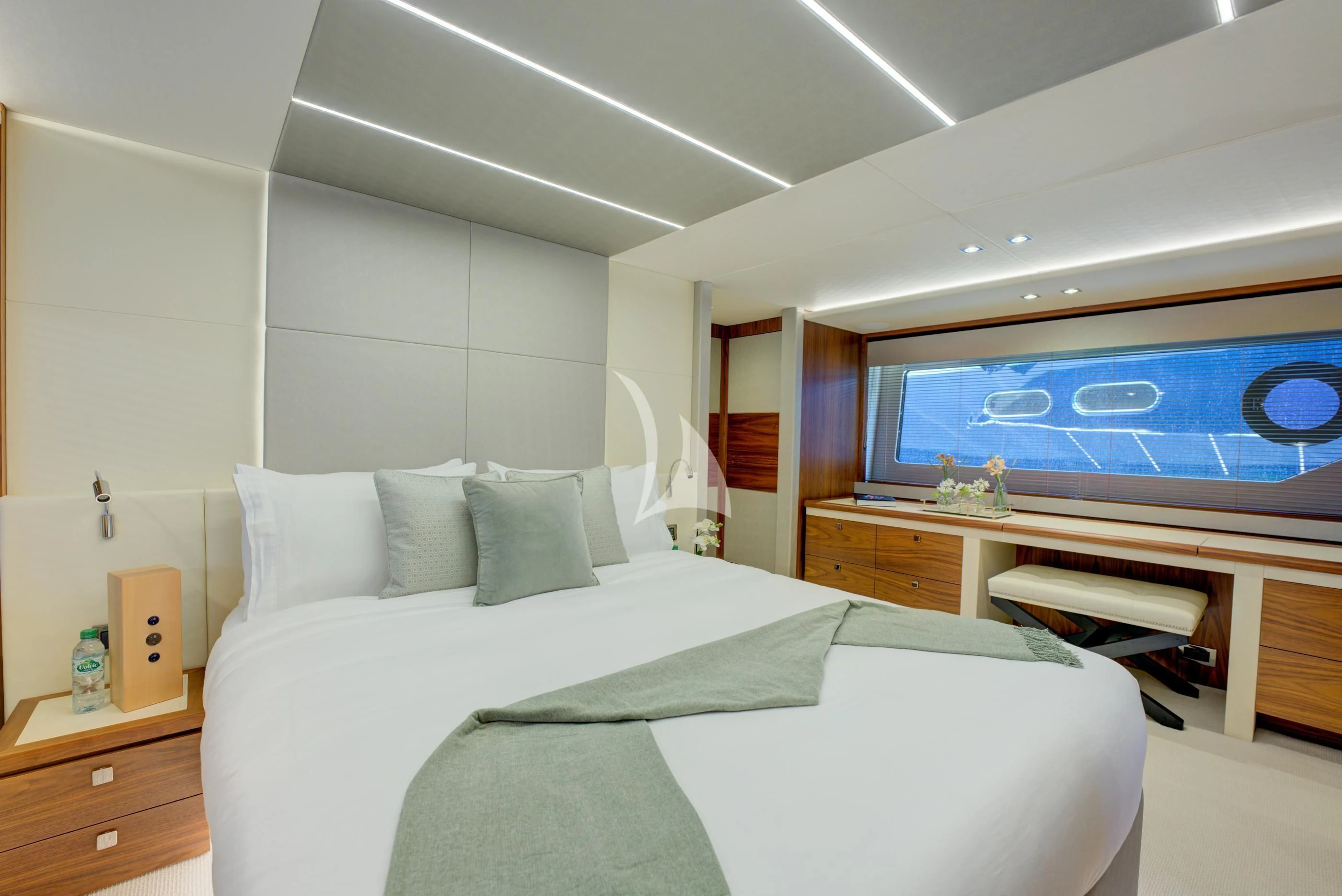 a room with a bed and a tv on the wall aboard MIKEL ANGELO Yacht for Charter