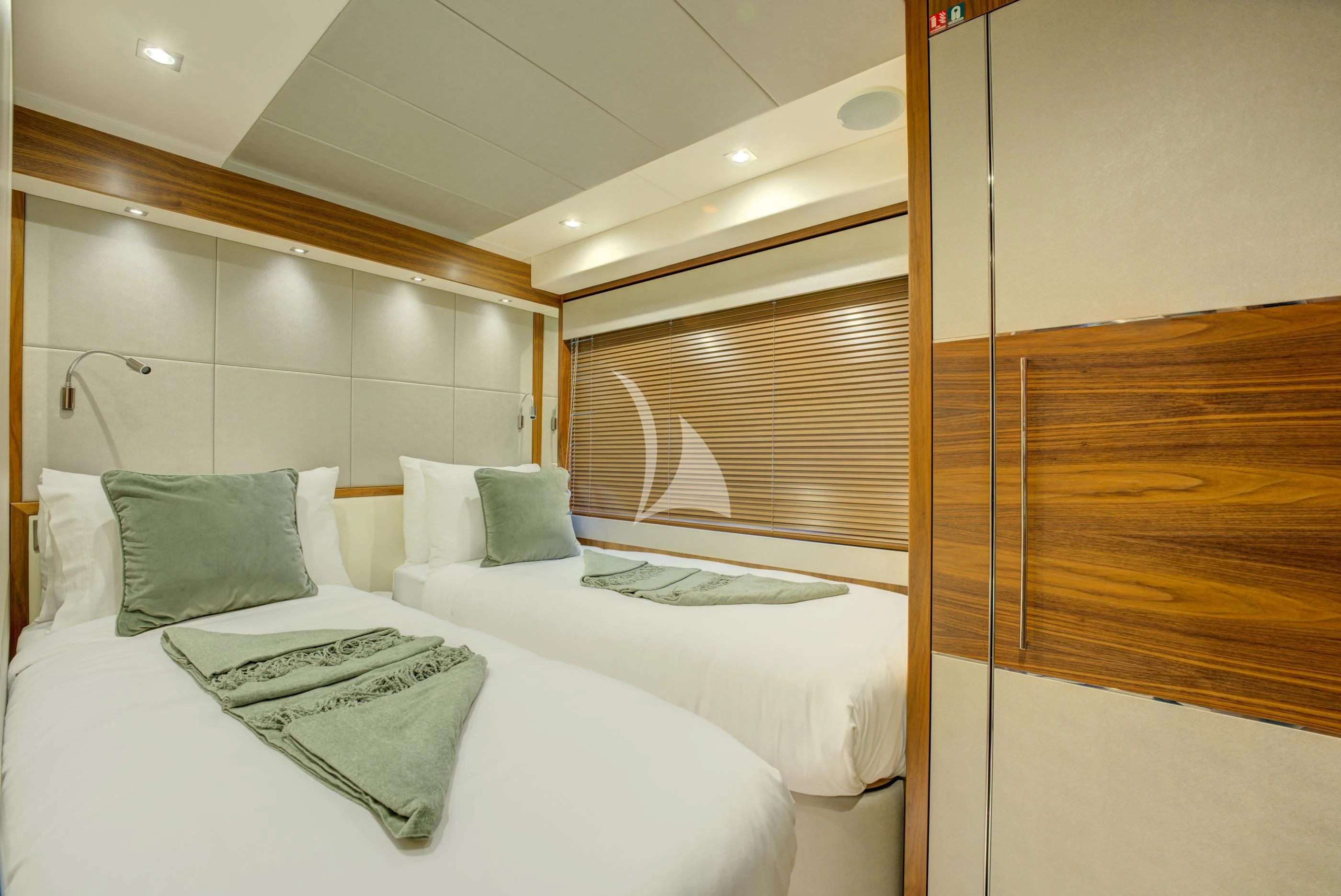 a room with two beds aboard MIKEL ANGELO Yacht for Charter