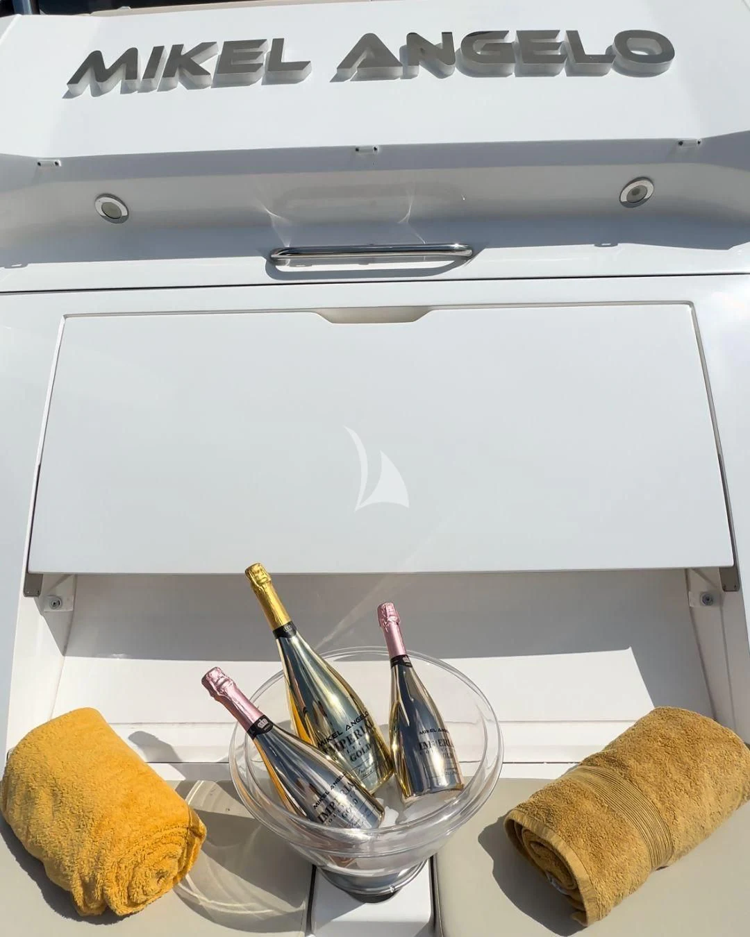 a kitchen sink with a towel and a knife aboard MIKEL ANGELO Yacht for Charter