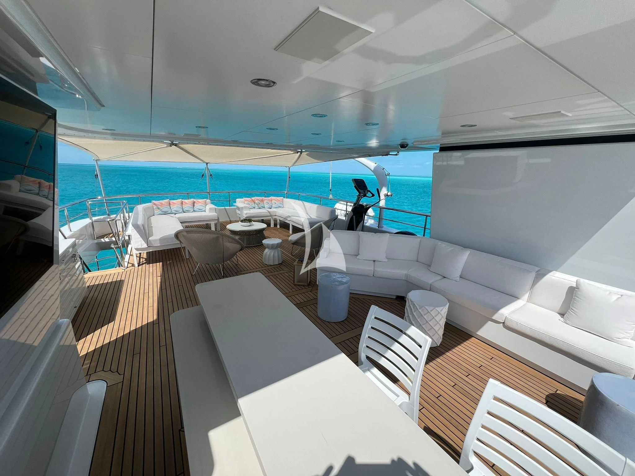 a room with a pool table and chairs aboard BELLA Yacht for Sale