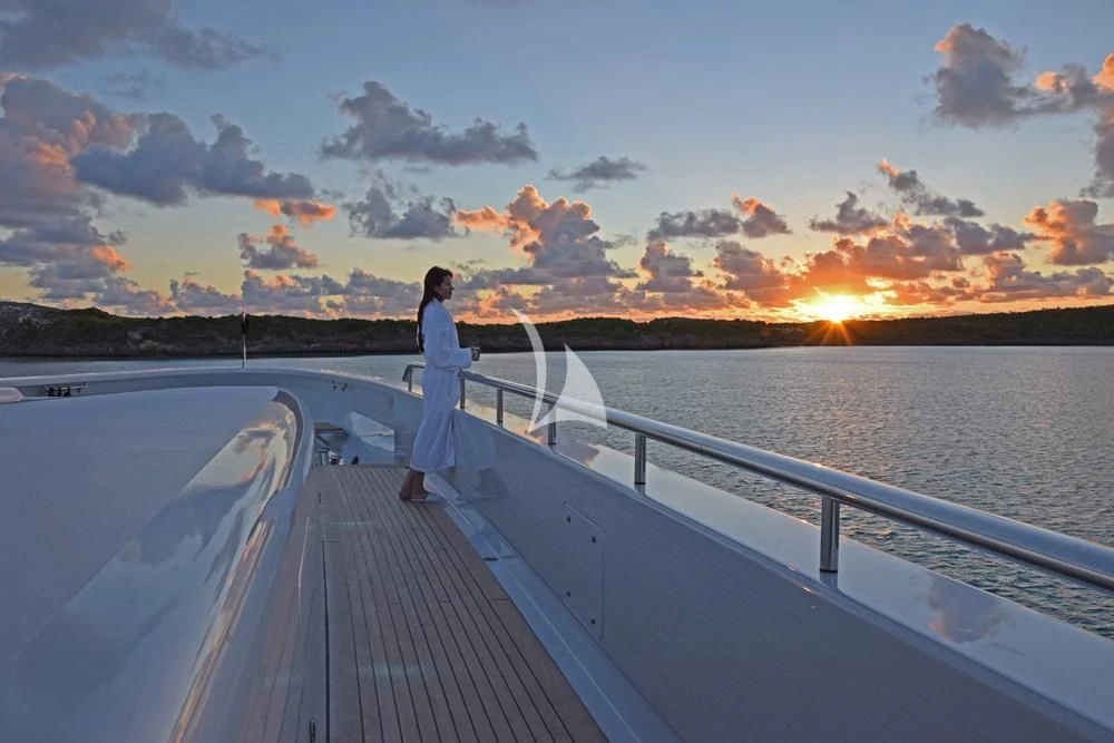 a person walking on a dock aboard BELLA Yacht for Sale