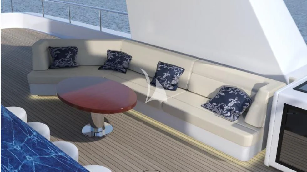 a couch with a table and chairs aboard BELLA Yacht for Sale