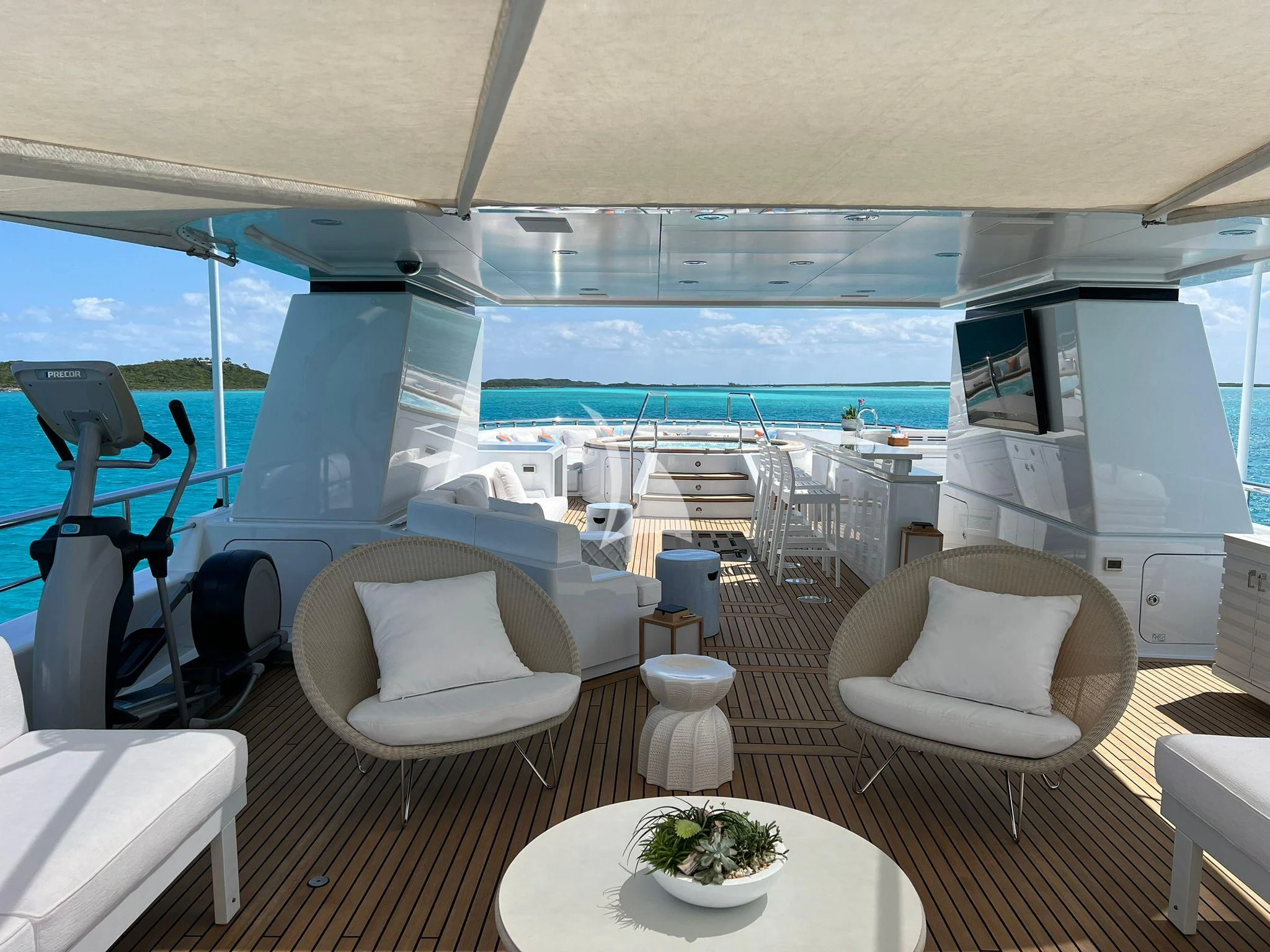 a room with a table chairs and a large window aboard BELLA Yacht for Sale