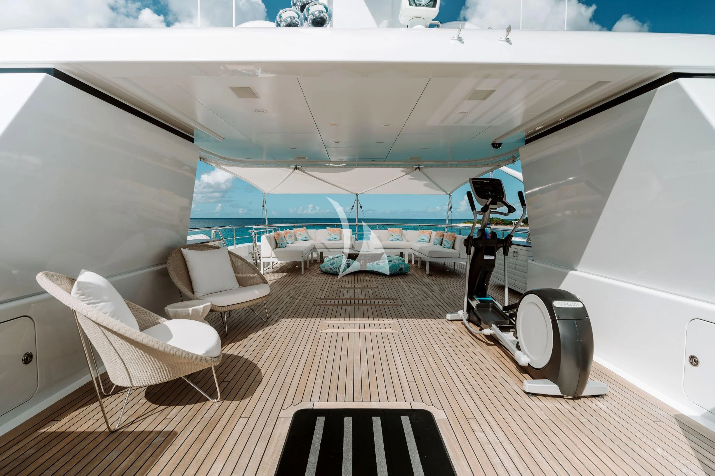 a person standing on a ladder in a room with a large mirror aboard BELLA Yacht for Sale