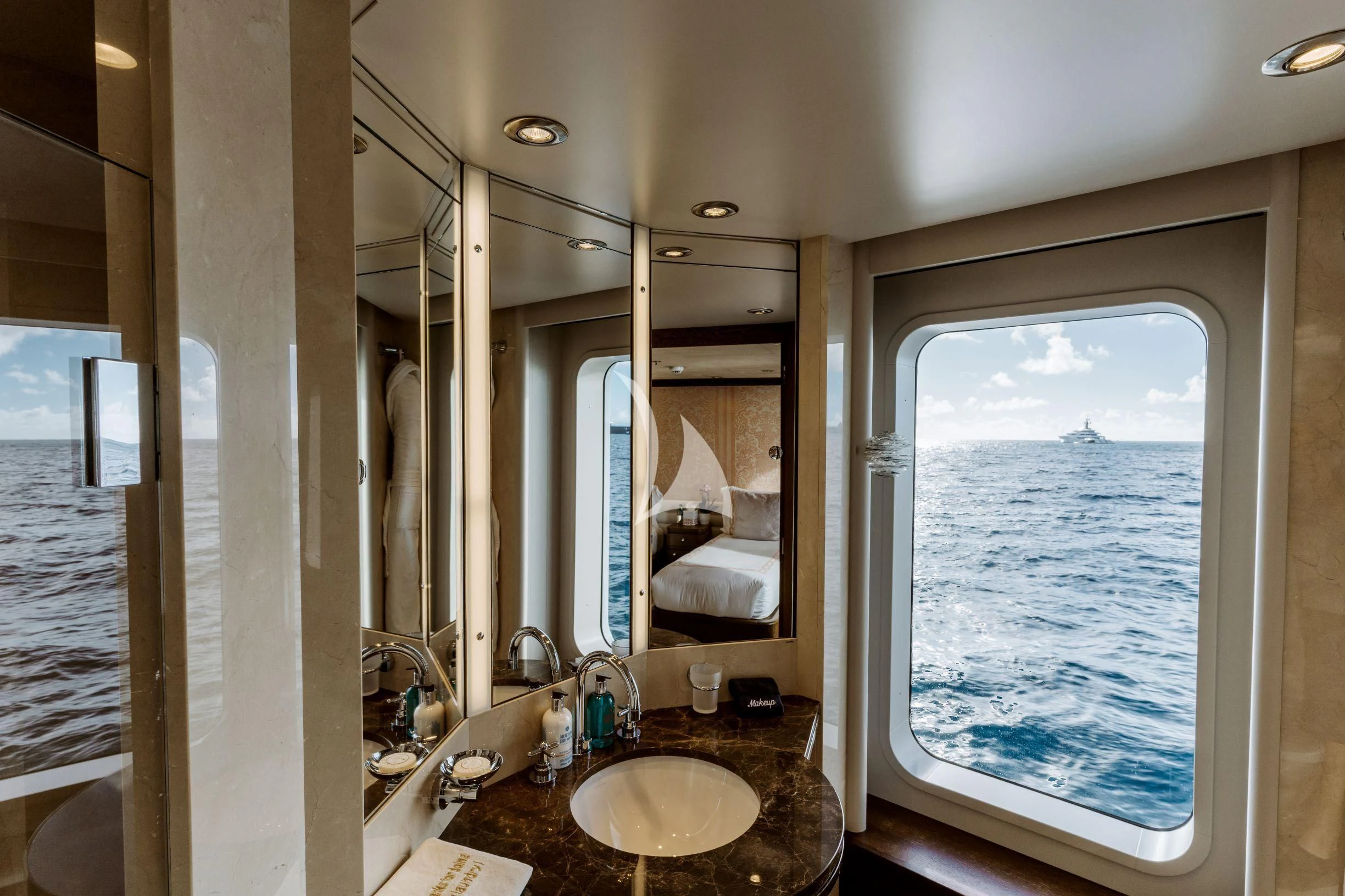a bathroom with a large window aboard BELLA Yacht for Sale