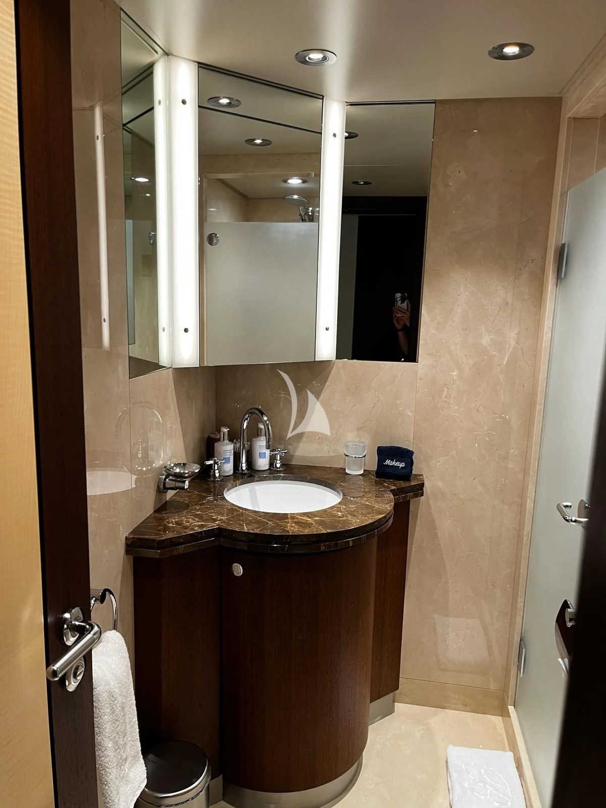 a bathroom with a sink and a mirror aboard BELLA Yacht for Sale