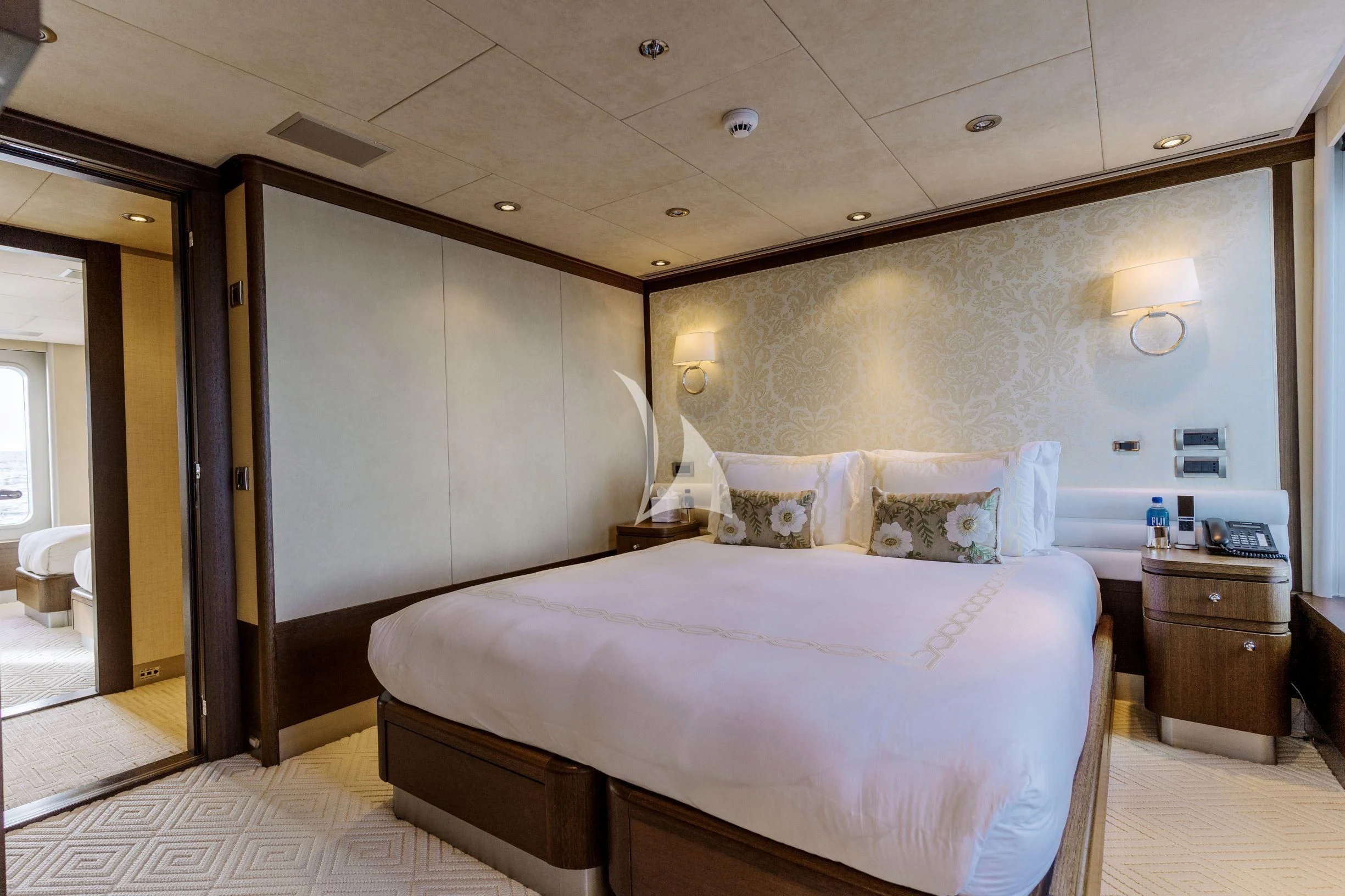 a bedroom with a bed aboard BELLA Yacht for Sale