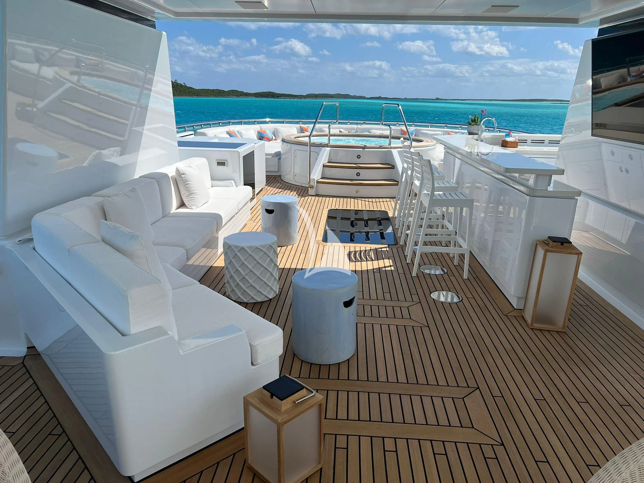 a room with a view of the ocean and a deck aboard BELLA Yacht for Sale