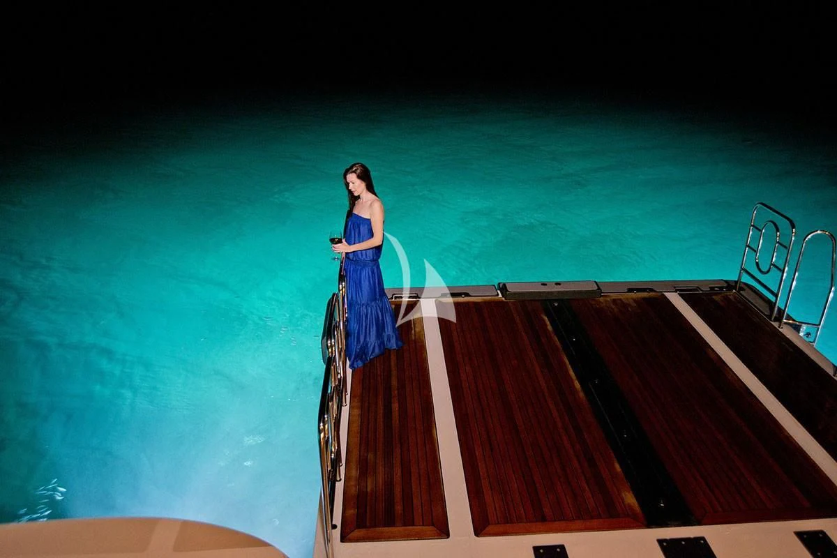 a person standing on a boat aboard BELLA Yacht for Sale