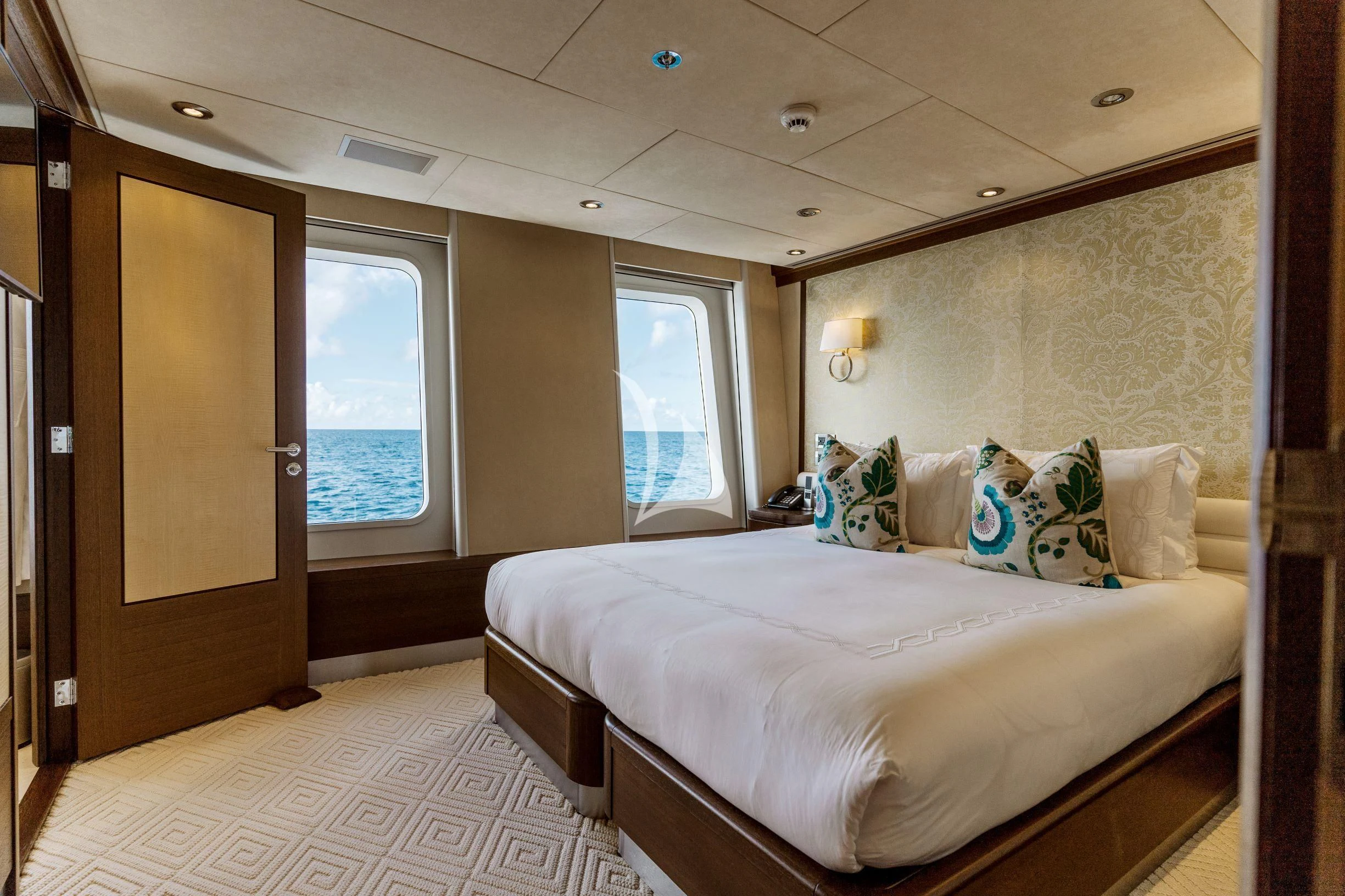 a bedroom with a bed aboard BELLA Yacht for Sale