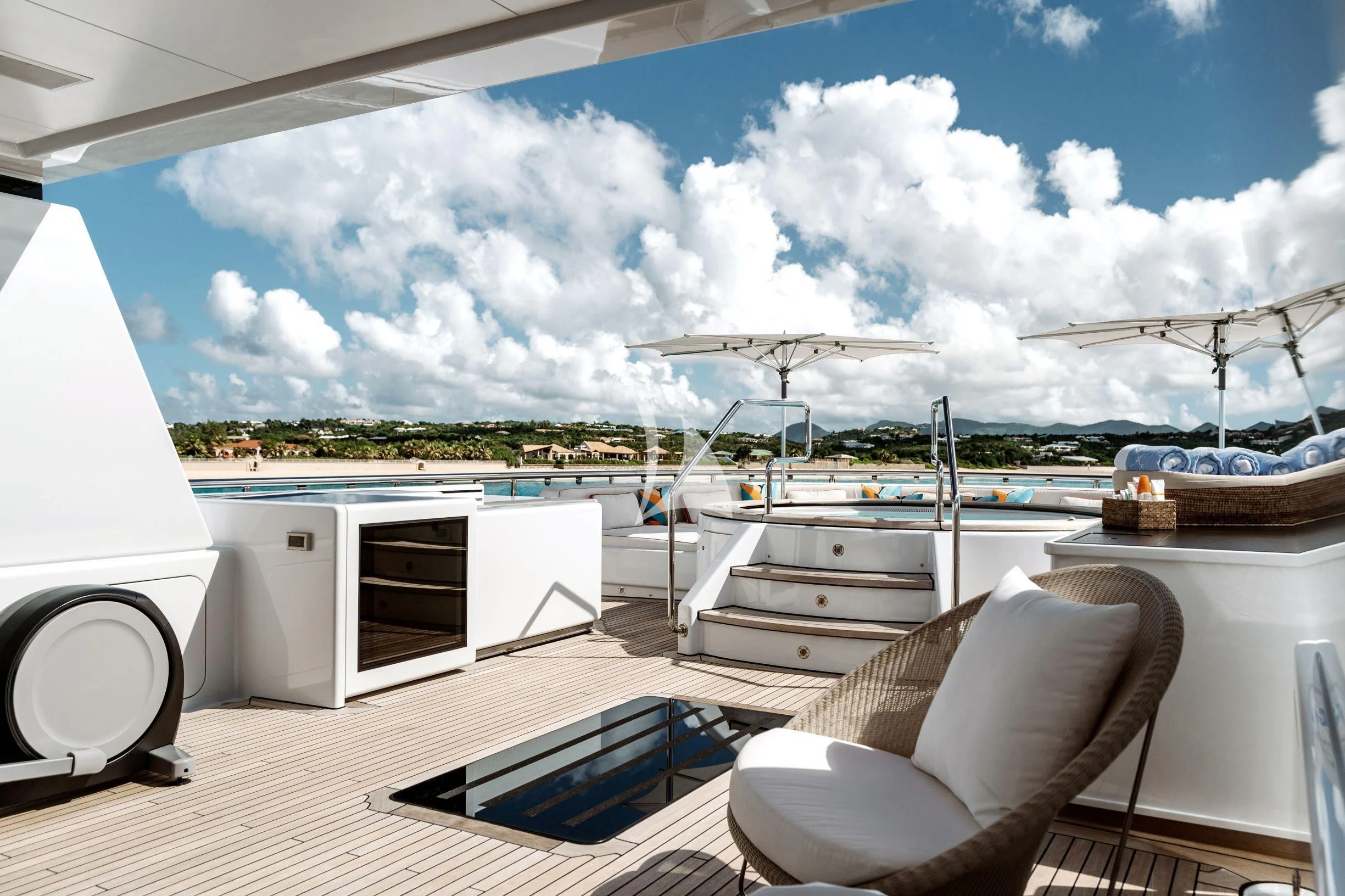 a room with a large window and a view of the water aboard BELLA Yacht for Sale