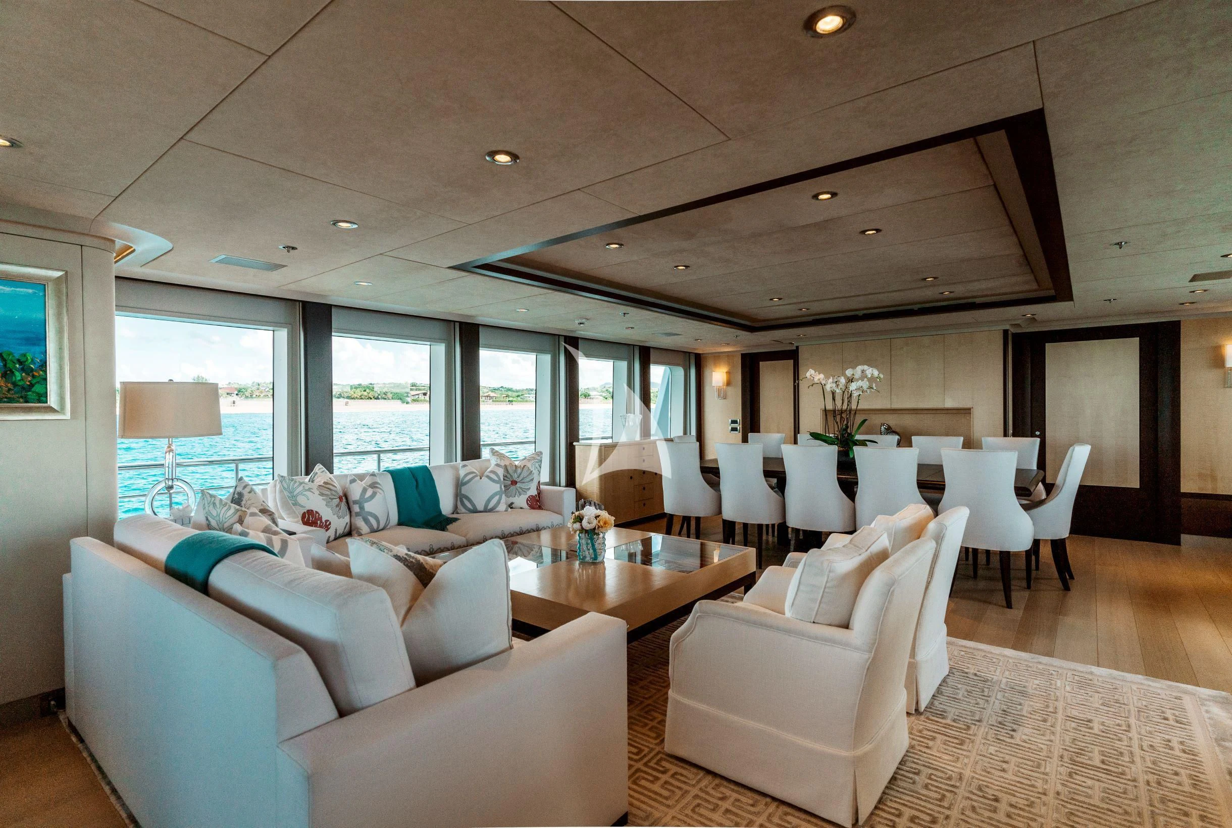 a living room with a large window aboard BELLA Yacht for Sale