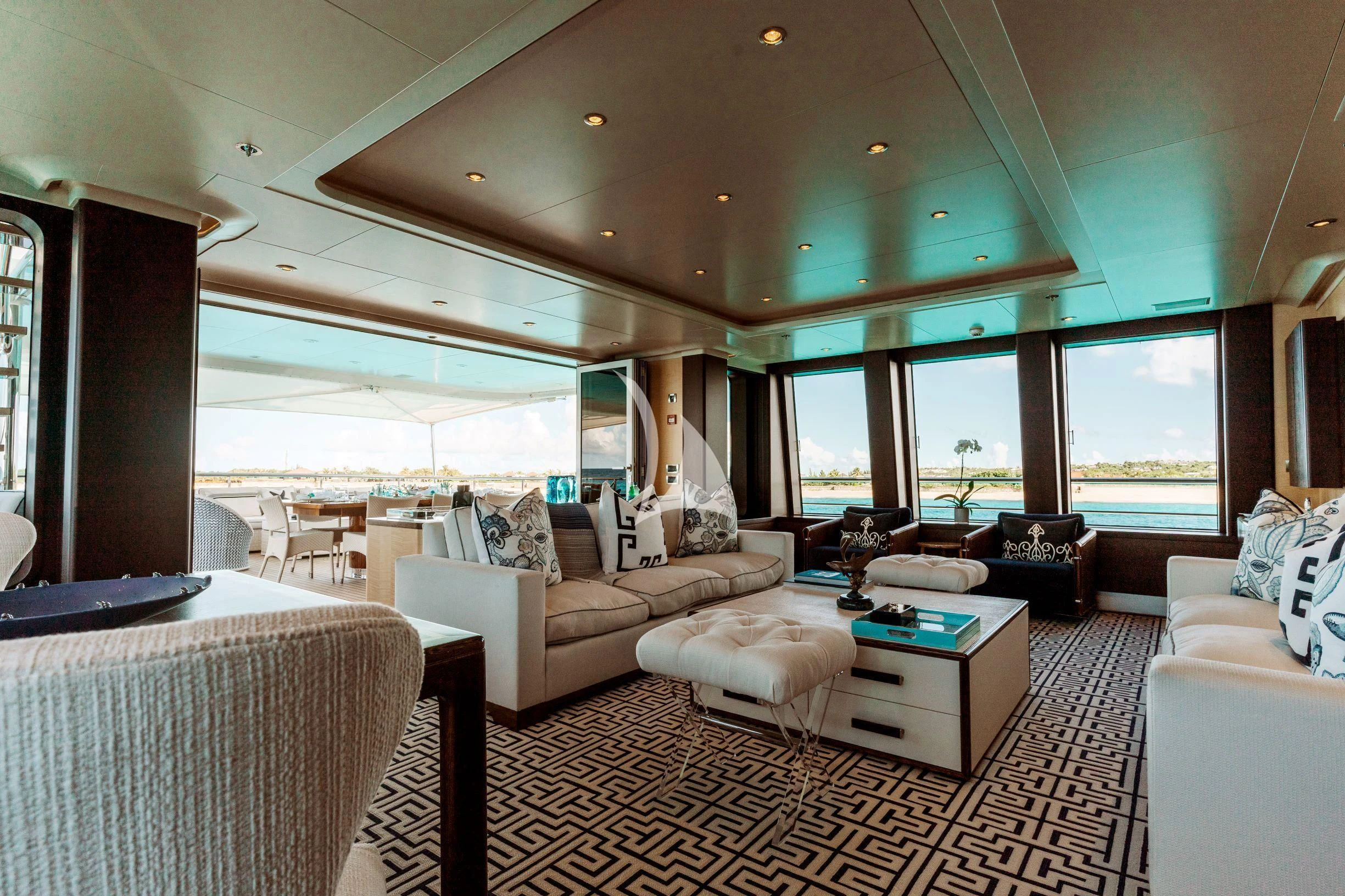 a living room with a large window aboard BELLA Yacht for Sale